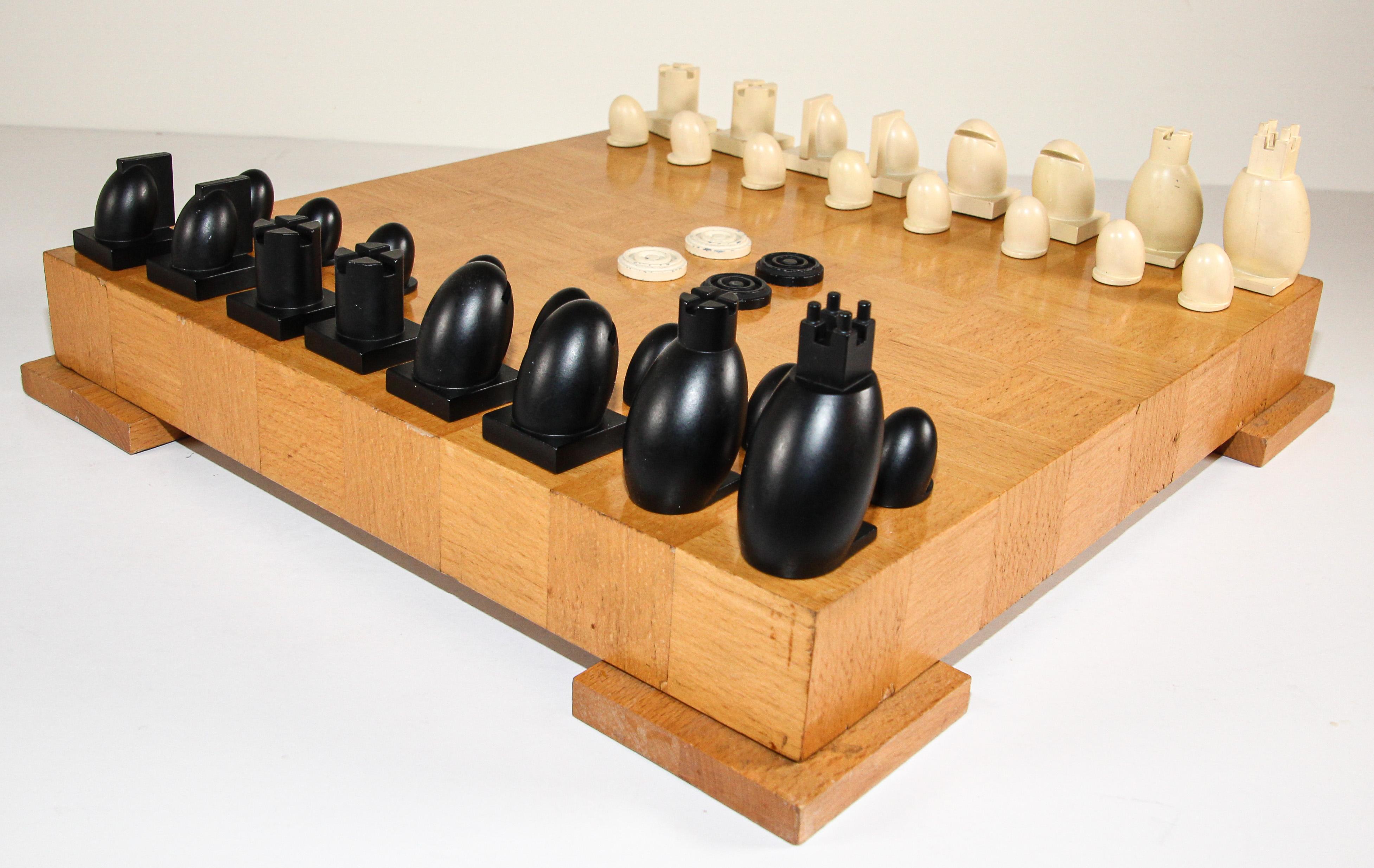 Original postmodern Michael Graves chess and checkers set.
Maple wood chess and checkers set with board and box by famed architect Michael Graves. 
Michael Graves was a Memphis Group designer and a member of the New York Five. Graves was a noted