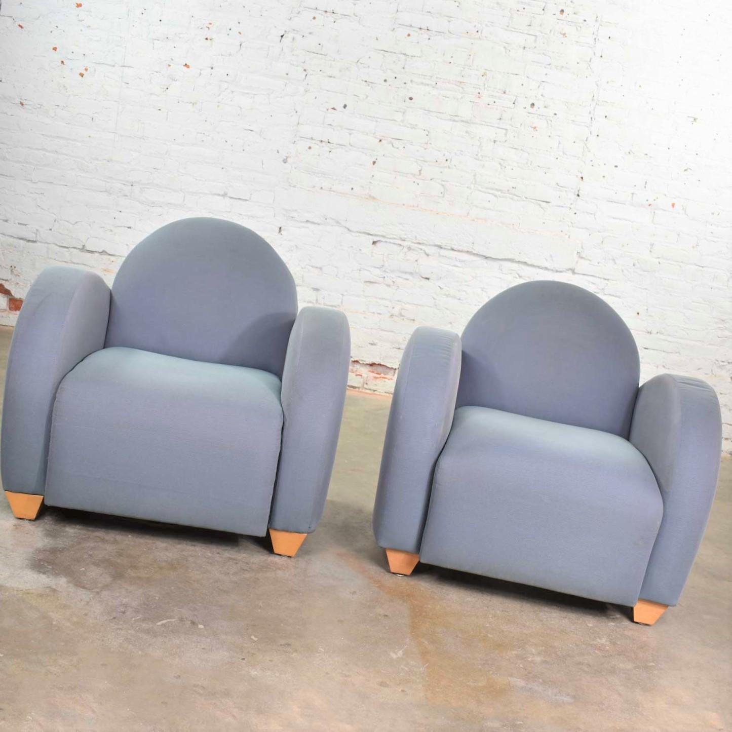 We are offering here a large number of Michael Graves designed postmodern club chairs or lounge chairs produced by David Edward Company. We have priced these chairs individually, but you may purchase multiples. There are currently 12 chairs. They