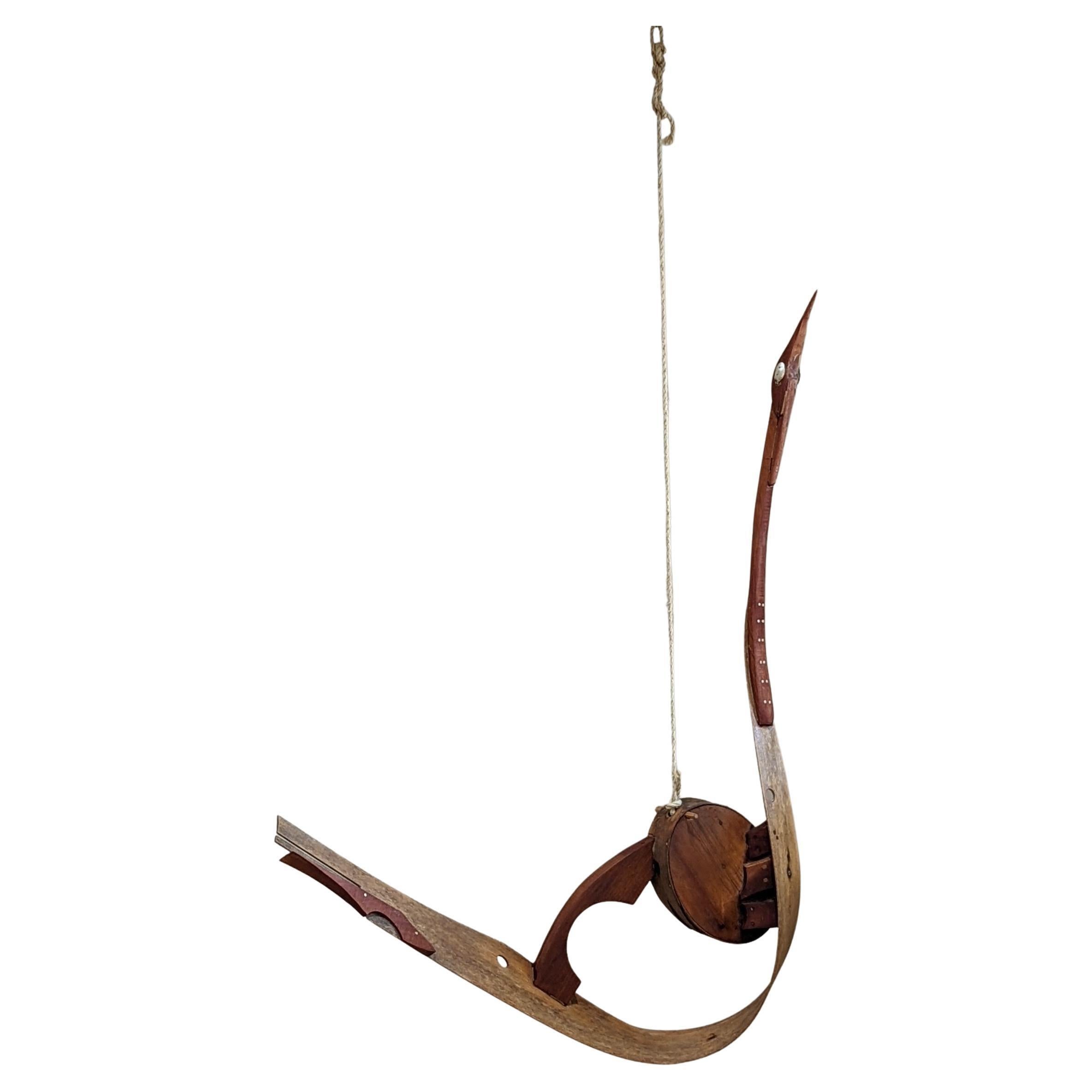 Abstract wooden bird mobil by Artist Michael Ince (1942- American). Mid-Century Modern Mobil Art Sculpture by Michael Ince. An early work 1970's of assembled cut crafted wooden pieces floating cloud like on natural rope. The delicate nature of his