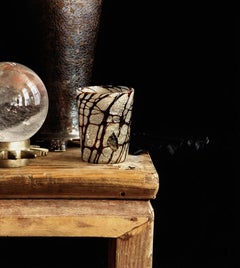 Still Life with a Coral Branch and a Crystal Globe, NYC. Color photograph