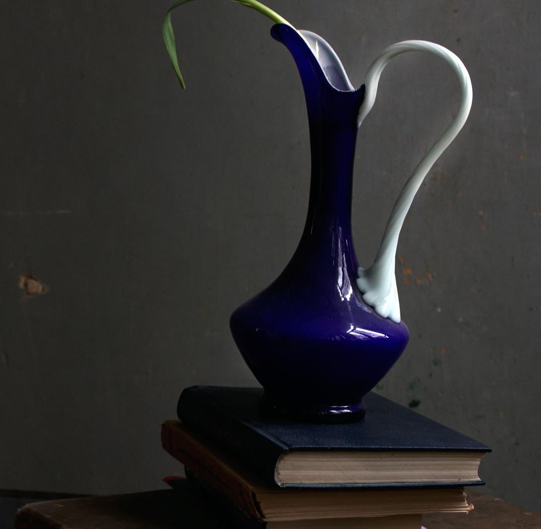 Still life with Books and a Dark Blue Opalina Vase, Antwerp. Color photograph - Contemporary Photograph by Michael James O’Brien