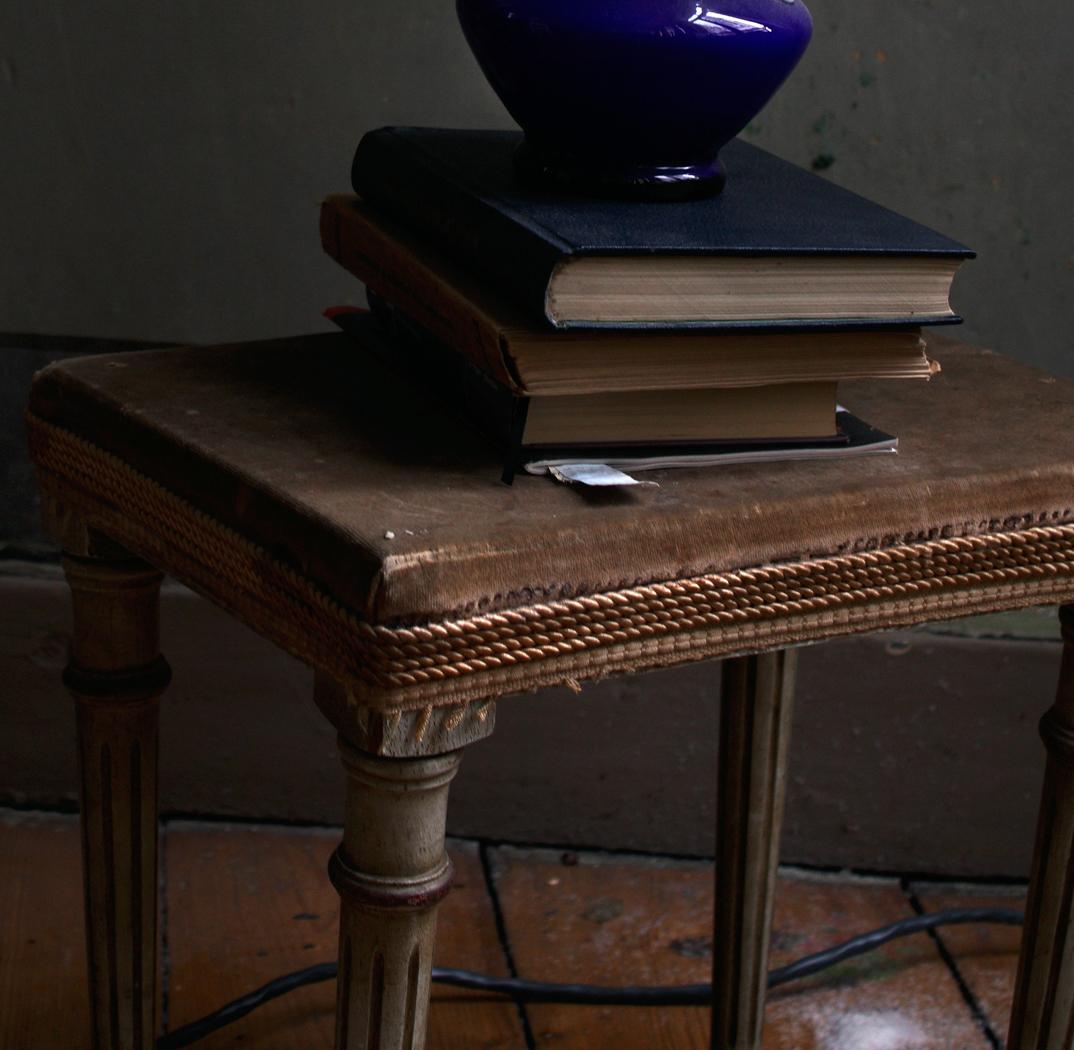 Still life with Books and a Dark Blue Opalina Vase, Antwerp. Color photograph - Black Still-Life Photograph by Michael James O’Brien