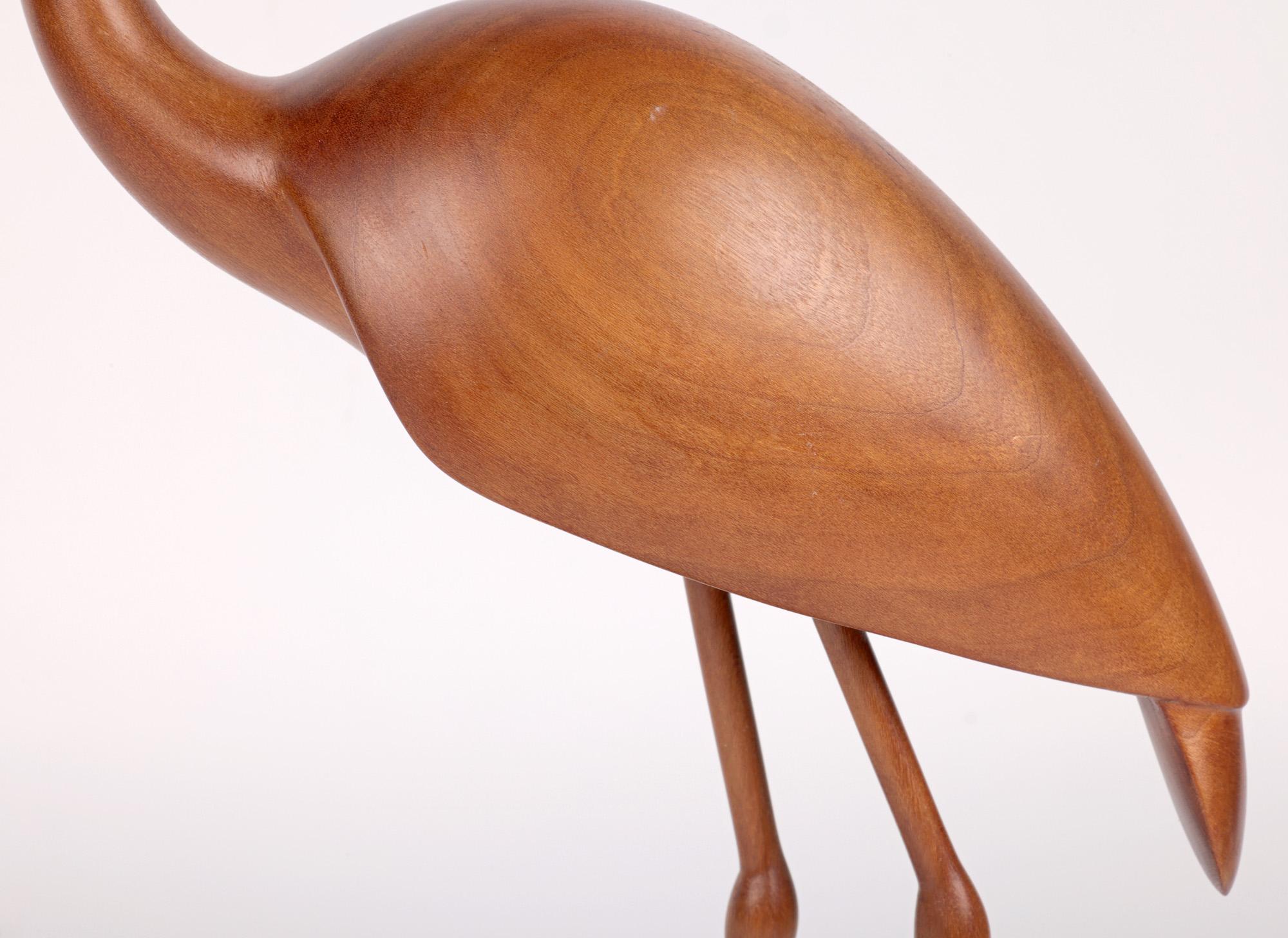 wooden heron statue