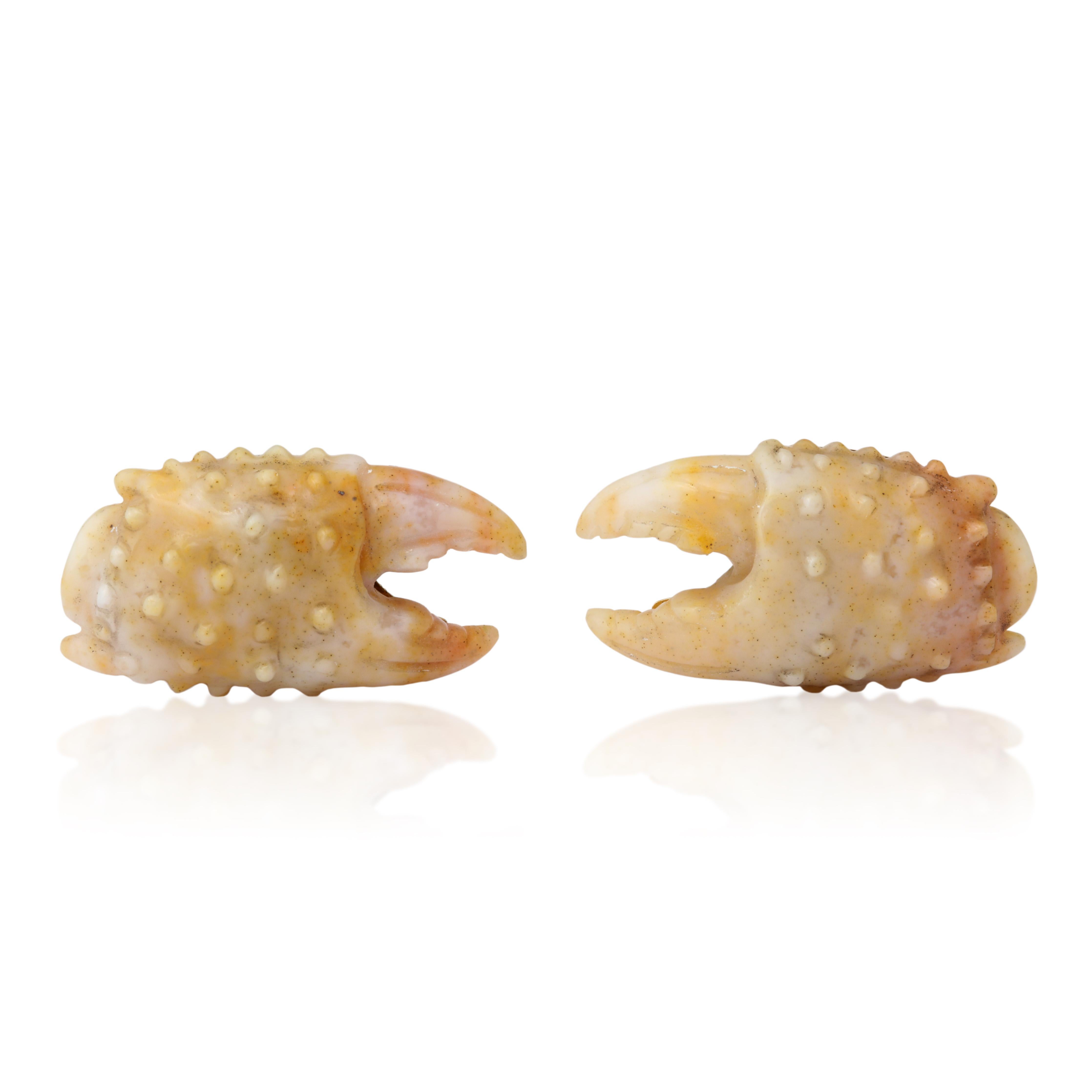 While you can only enjoy the seasonal delicacy of stone crab claws from October through May, these wonderful cufflinks can be worn all year long.  They are realistically carved from a rare type of chalcedony found in Madagascar, and expertly mounted