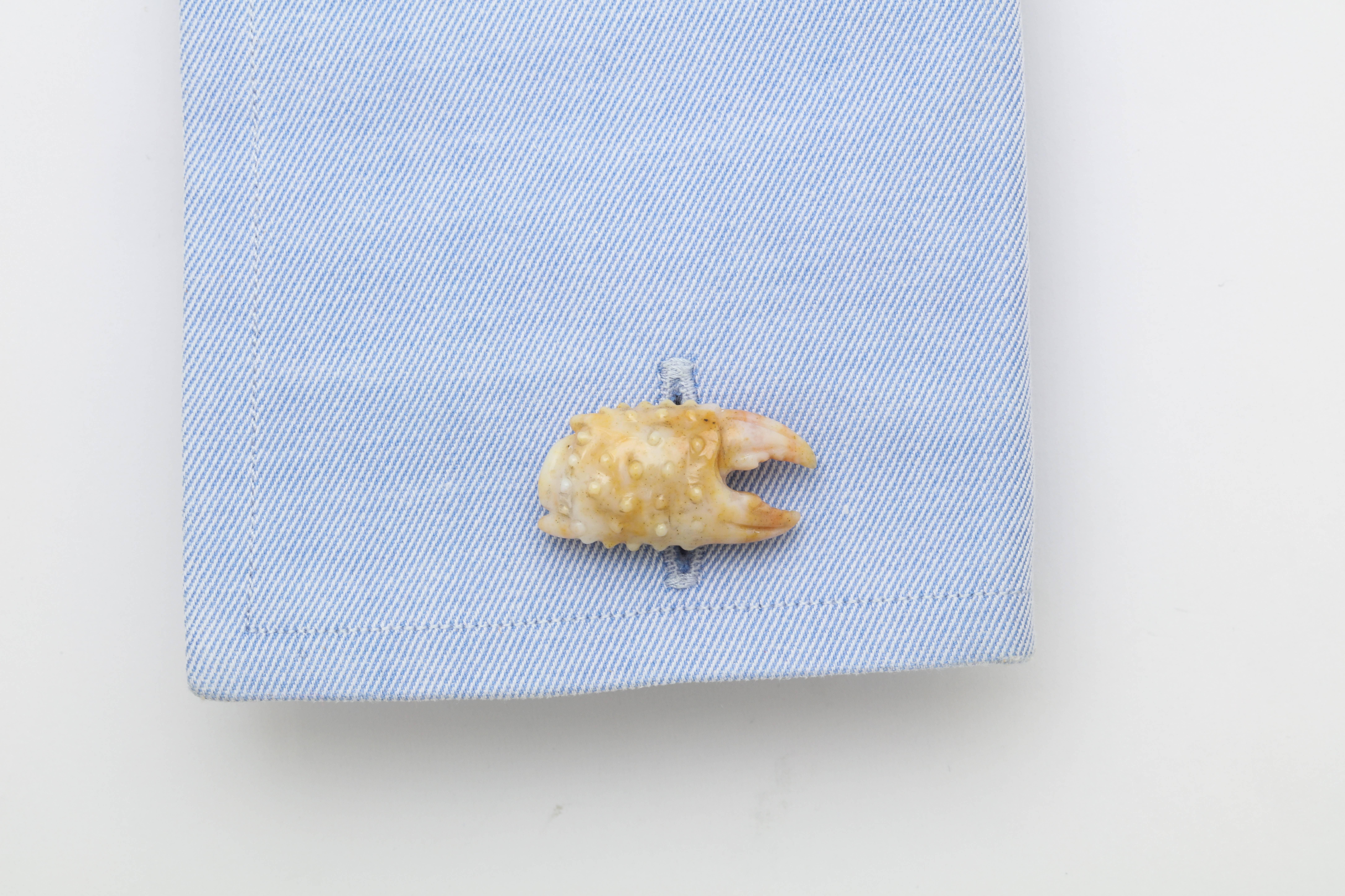 While you can only enjoy the delicacy of stone crab claws from October through May, these wonderful cufflinks can be worn all year long.  They are realistically carved from a particular type of chalcedony which is found in Madagascar.  Expertly
