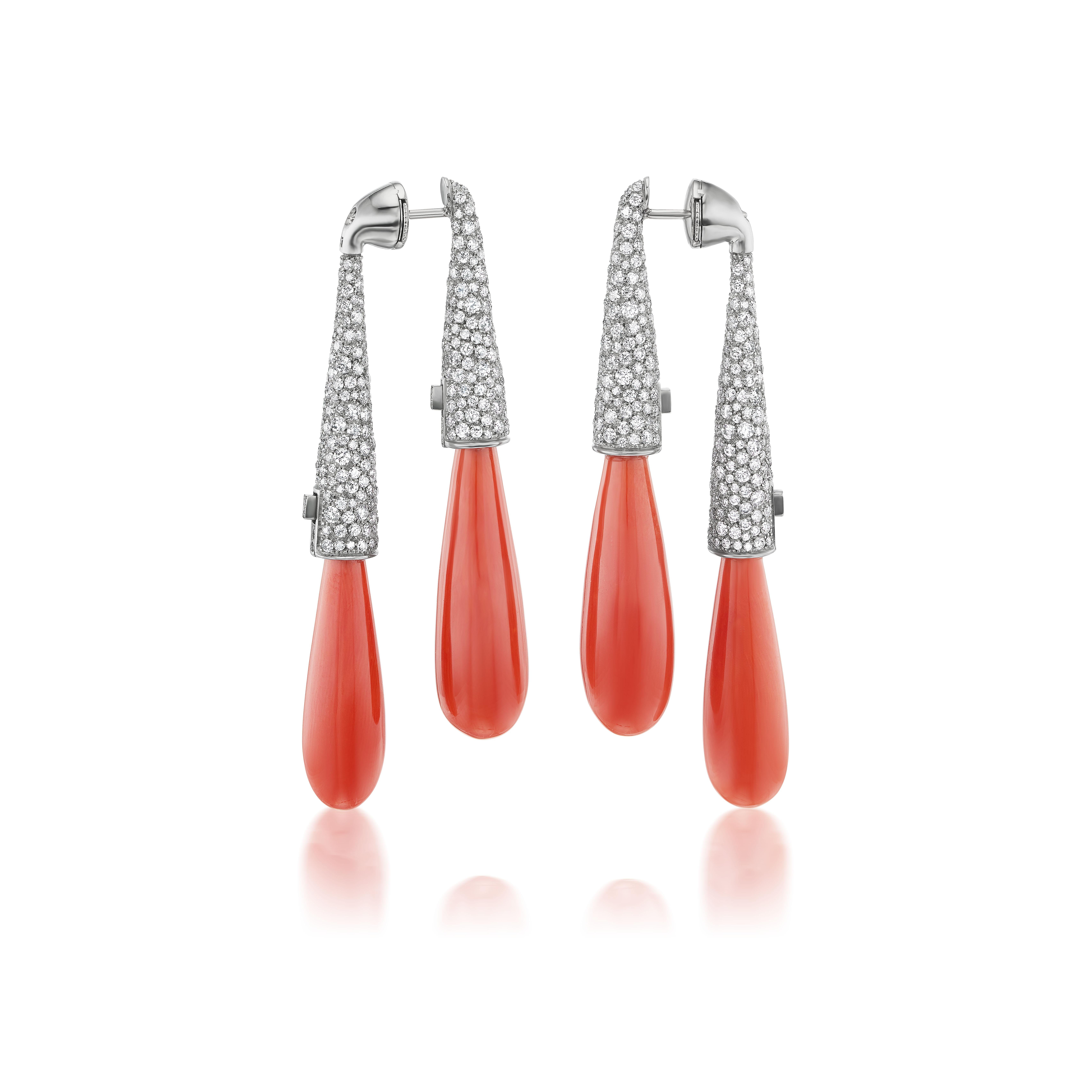 An absolutely unique design, these earrings are true showstoppers. The larger drops hang from behind the ear, while the perfectly matched smaller drops are in front. In fact, it's almost like wearing two pairs of earrings at once.  However the metal