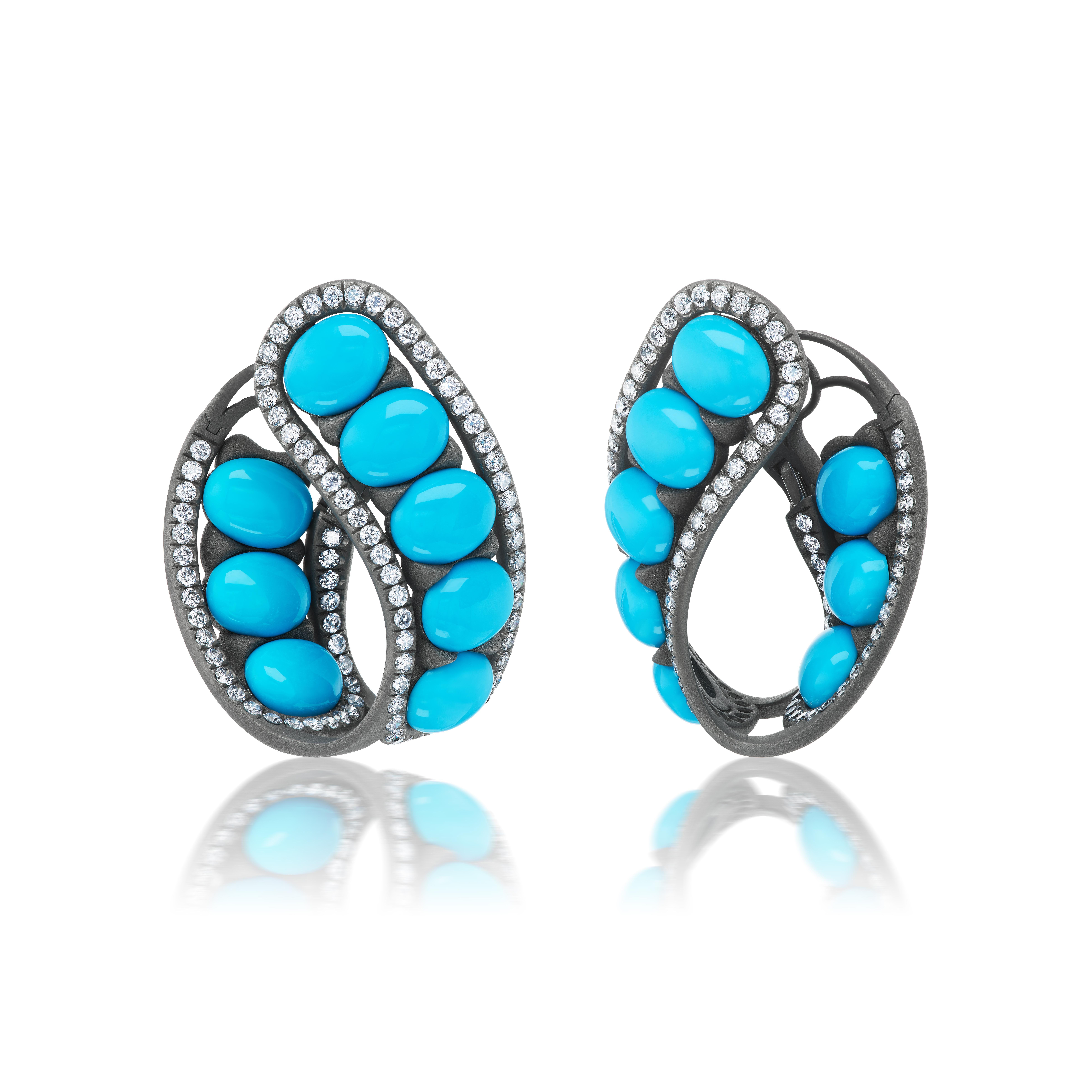 A bold and striking design, featuring bright blue Sleeping Beauty turquoise, framed with diamonds and mounted in brushed grey titanium.   At a full 1 1/2 x 1 1/4 inches these are definitely statement earrings, however the use of titanium makes them