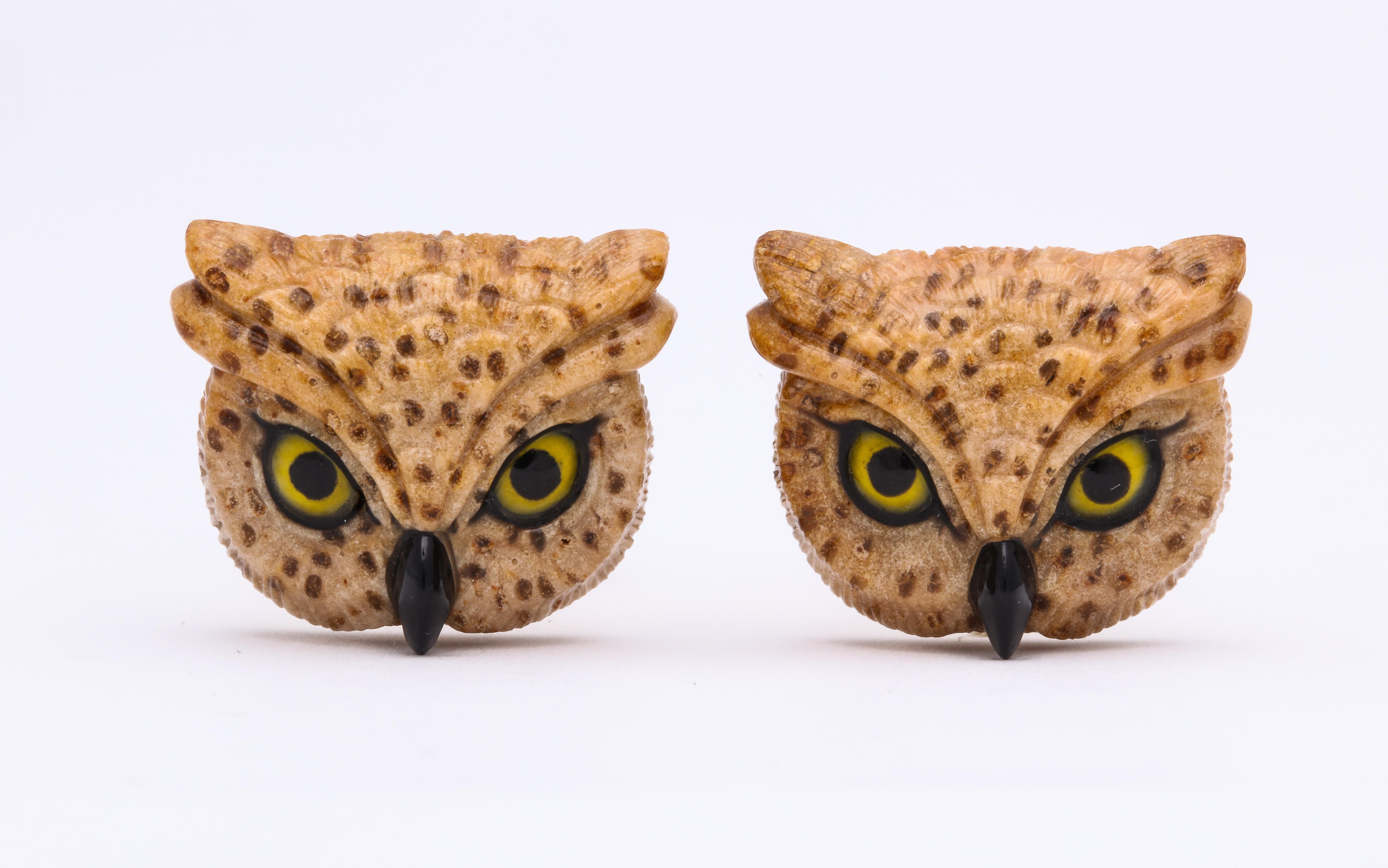 A harbinger of death in Africa, a lucky talisman for the Japanese and a symbol of wisdom in the West, there are also over 200 different species of owls.  That being said, these cufflinks are the finest owls that have been carved from fossilized palm