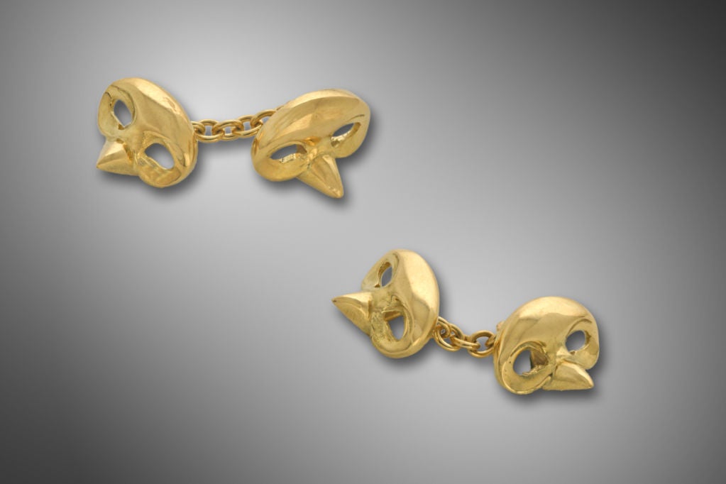 18kt gold mask cufflinks depicting the Neopolitan theatrical character Pulcinello.  Available in 18kt yellow or rose gold.  Please specify gold preference when ordering.

Described by Departures Magazine as, “being a hit with men searching for
