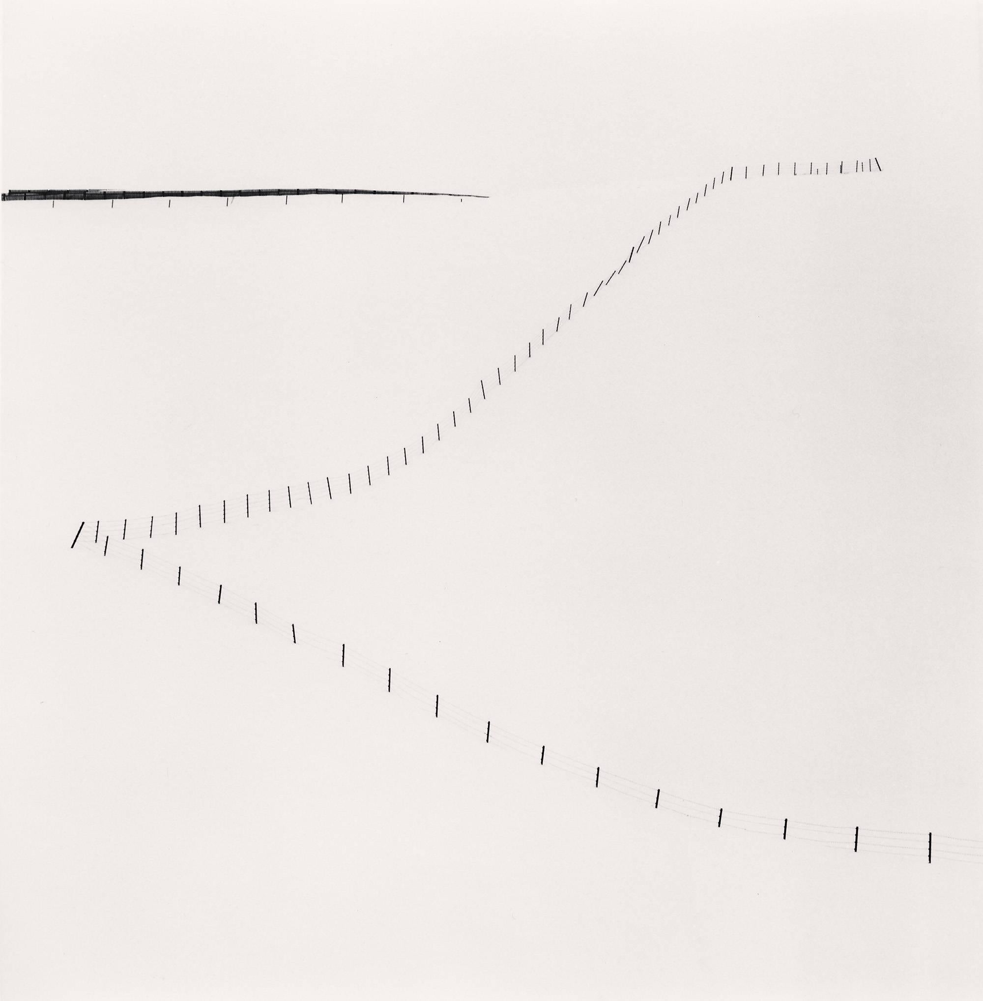 Michael Kenna Black and White Photograph - Hillside Fence, Study 6, Teshikaga, Hokkaido, Japan. LTD, silver gelatin print 