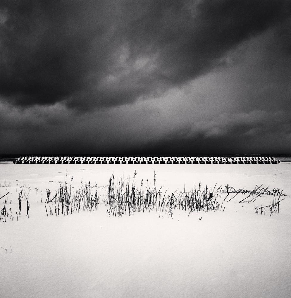 Michael Kenna Landscape Photograph –  Threatening Clouds, Tokimaru Beach, Hokkaido, Japan