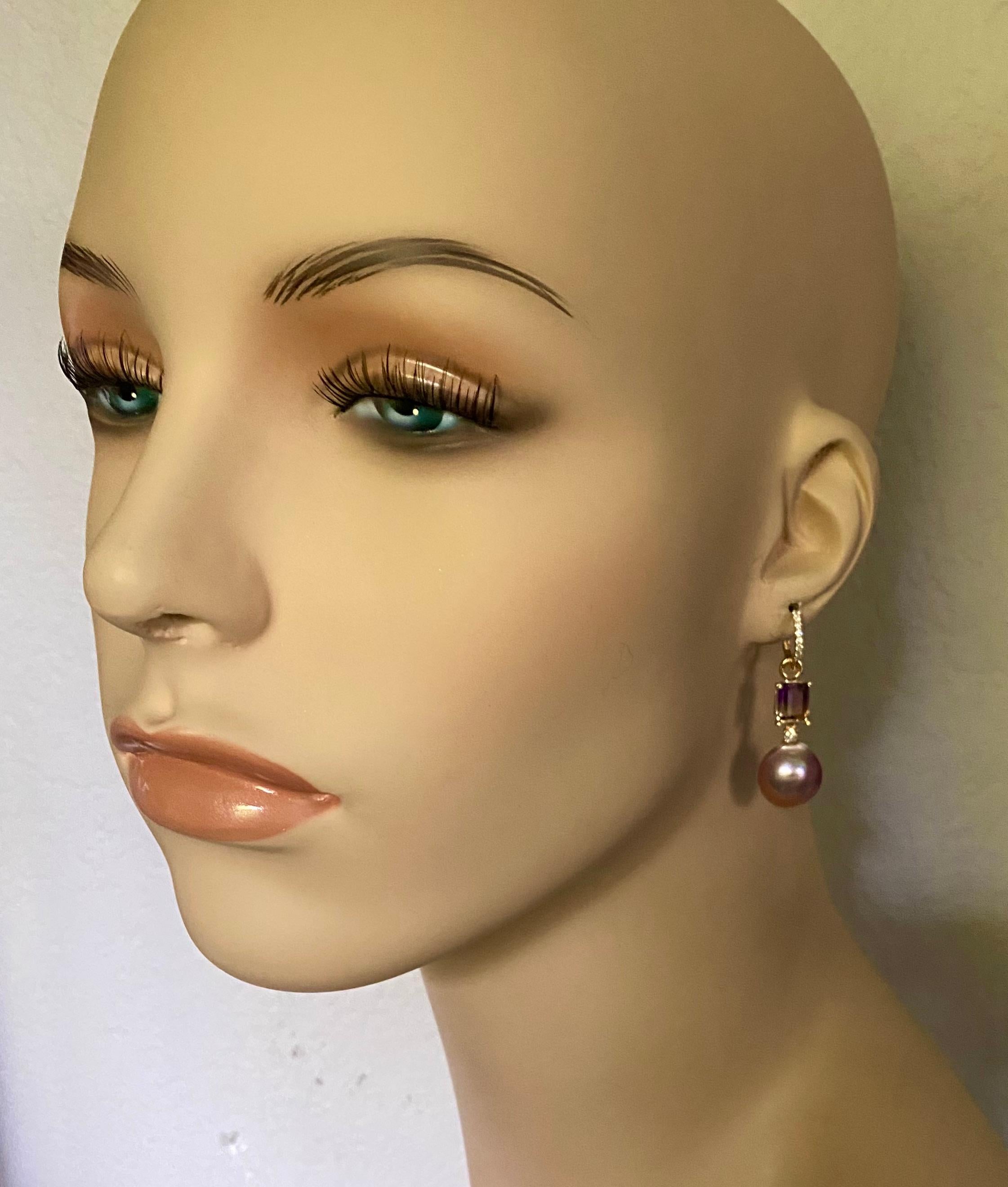 Kasumi pearls are featured in these elegant and versatile dangle earrings.  Kasumi pearls come from Japan.  Their proper name is Kasumiga.  They are typically baroque in shape, have a strong iridescence and possess multiple colors from purple, gold