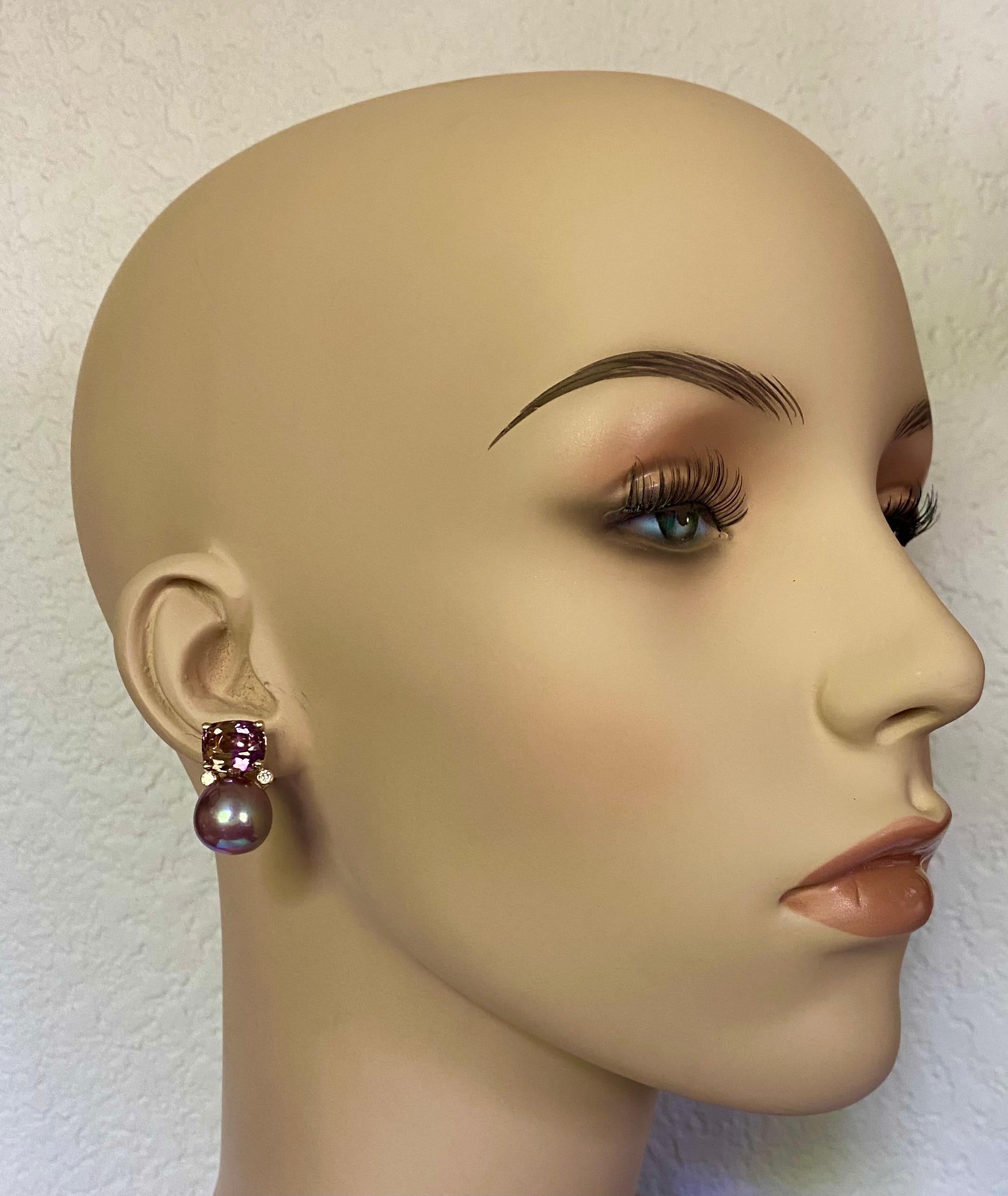 Ametrine is paired with lavender colored pearls in these delicate drop earrings.  Ametrine (origin: Bolivia), meaning half amethyst, half citrine and are expertly cut and faceted in cushion shapes.  The slightly drop shaped freshwater pearls are an