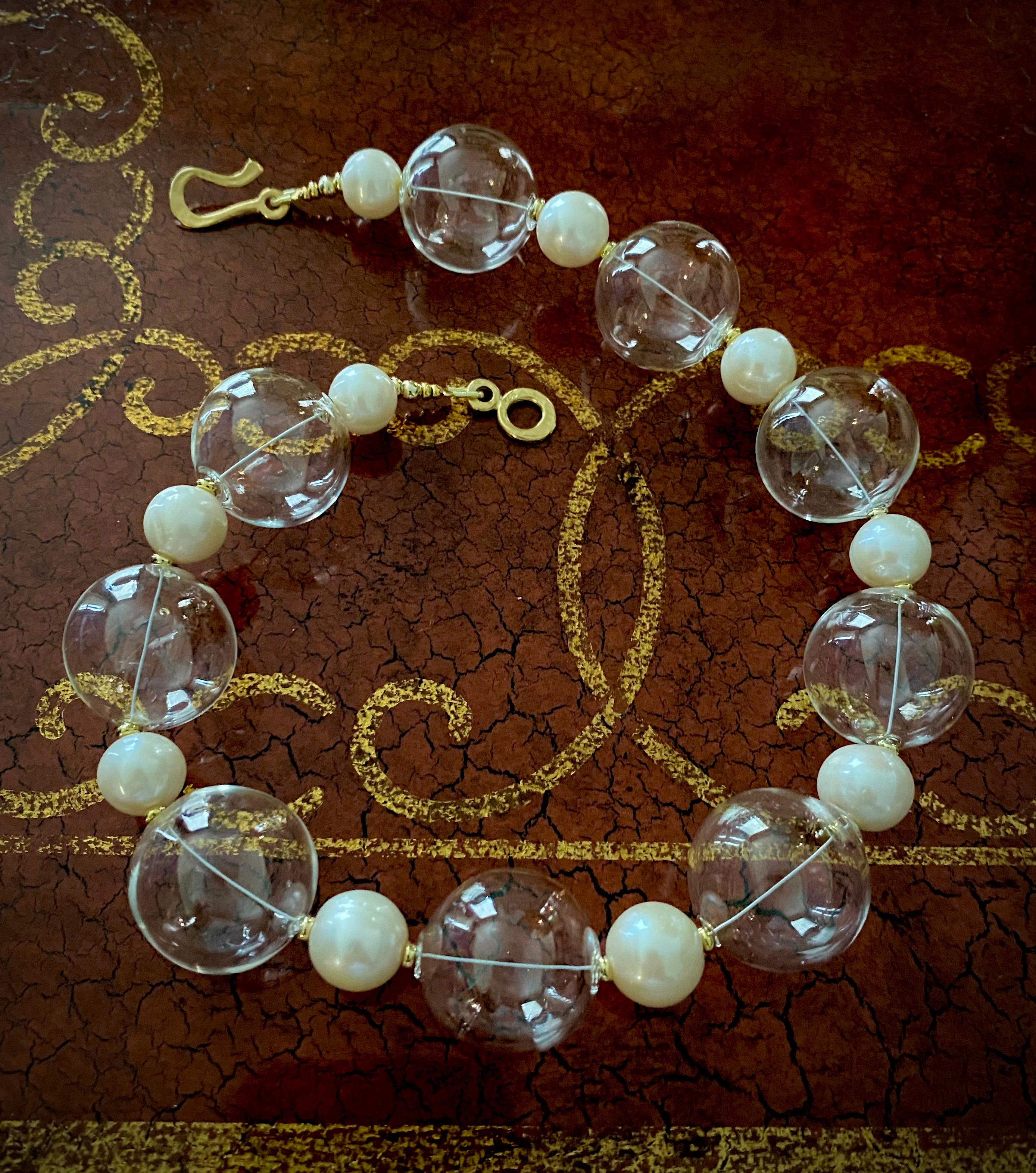 32 inch freshwater baroque pearls with mirror cut aquamarine and 18kt gold rondelles