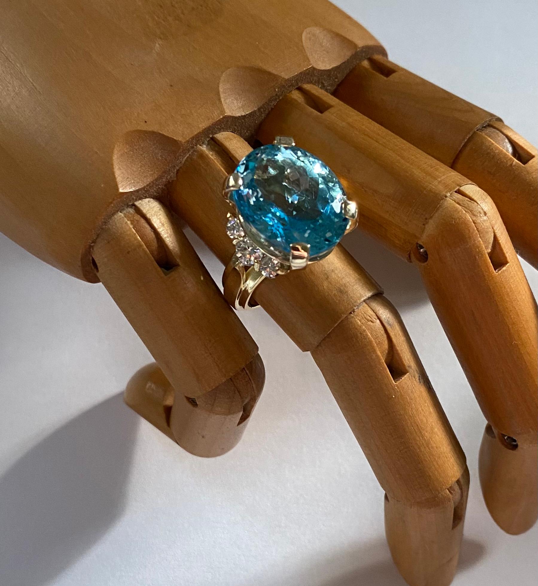 Blue topaz is the centerpiece of this bold cocktail ring.  The gem weighs 24.47 carats.  The color is referred to as 