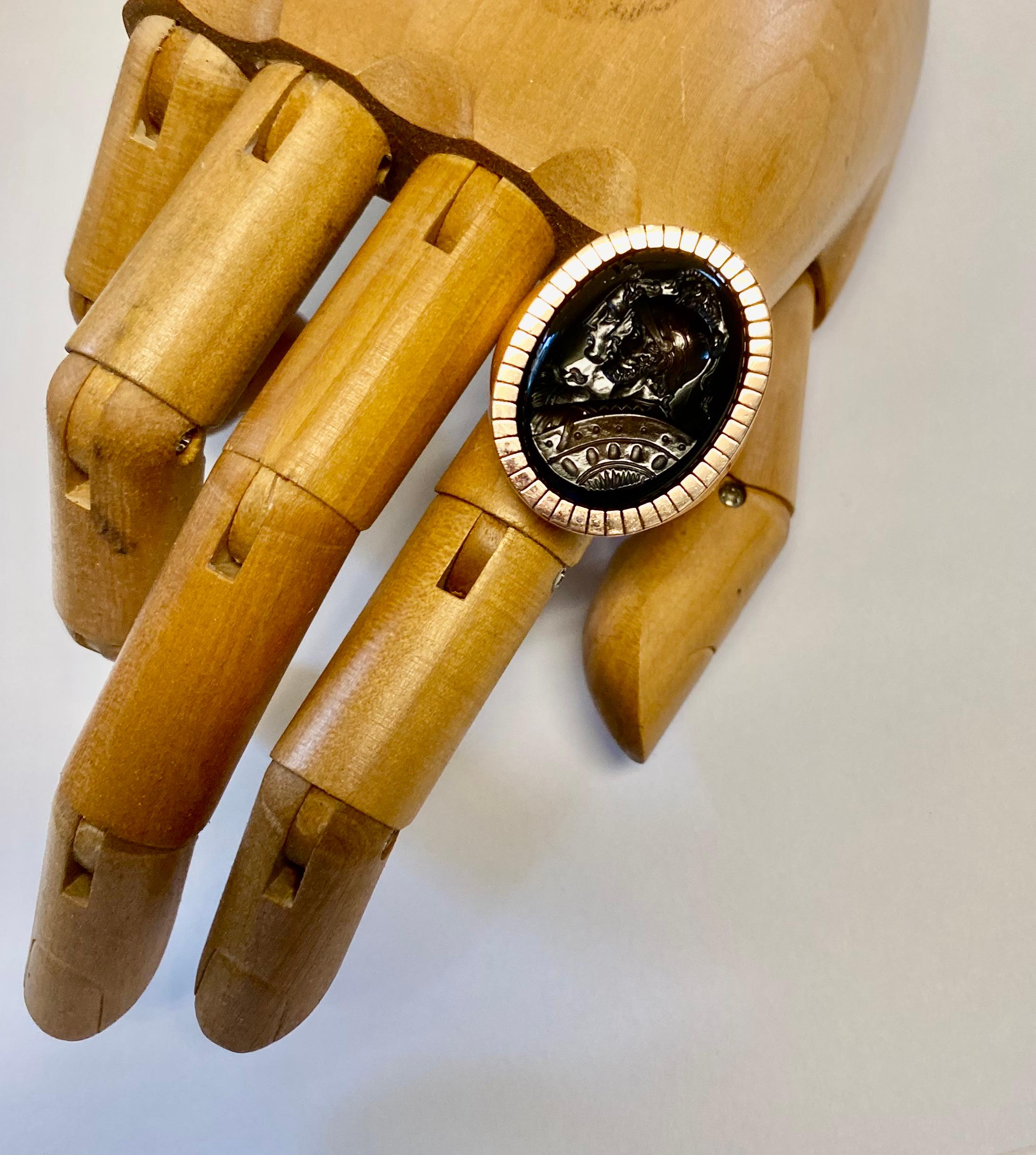 A carved agate intaglio is showcased in this bold signet ring.  The 