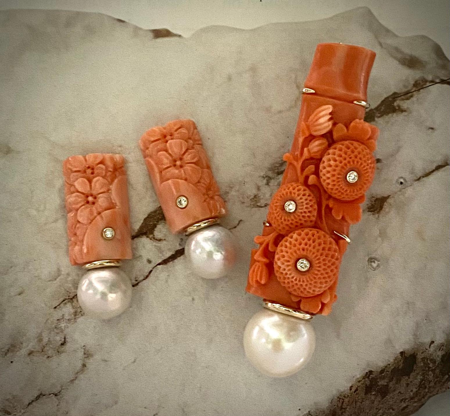 Carved coral is featured in this drop earring and brooch suite.  Satsuma coral, also known as Momo coral (Japanese for peach) refers to the coral's intense peach-pink to crimson coloring.  It is highly valued for use in high-end jewelry.  These