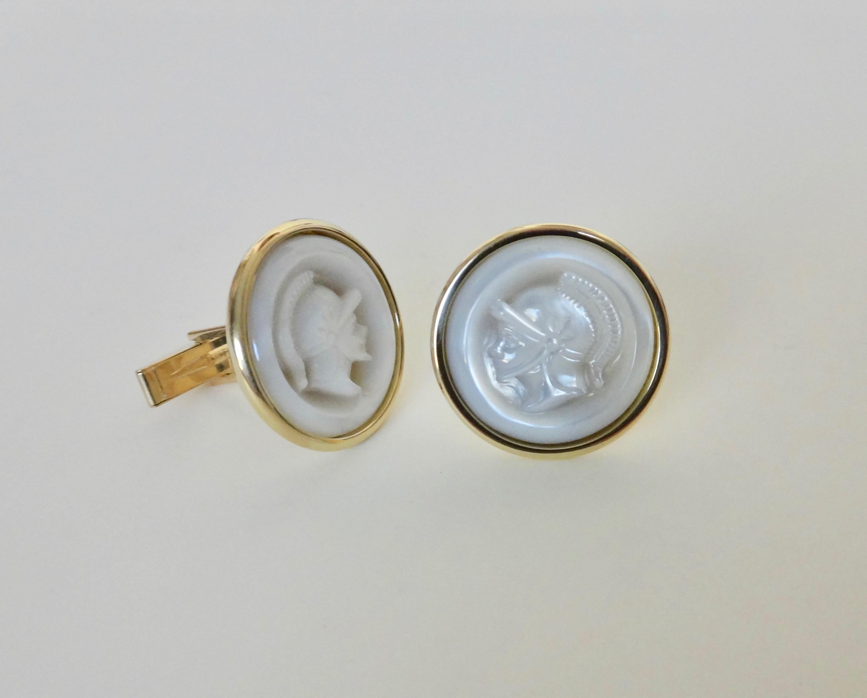 Carved in Germany, a classically sculpted pair of mother-of-pearl gladiator head cameos are featured in these one-of-a-kind, 18k yellow gold cuff links.  Sleek and time-honored, the pair make the perfect gift for the discriminating gentleman.  
