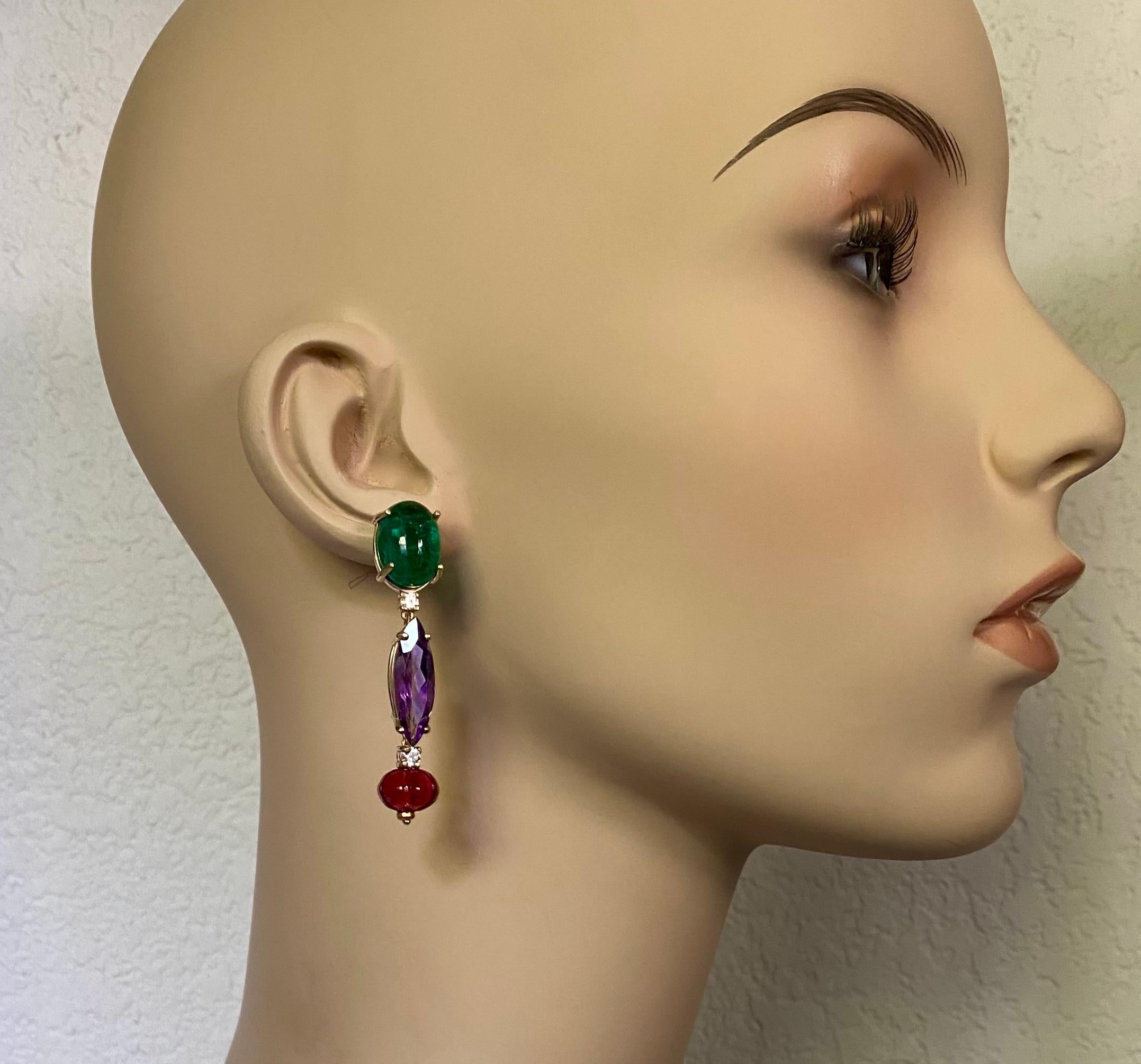 Chrome diopside, amethyst, diamond and pink tourmaline are mixed in these dramatic dangle earrings.  Chrome diopside (origin: Russia) forms in relatively thin crystals, therefore, the gems are usually found in smaller finished sizes.  These