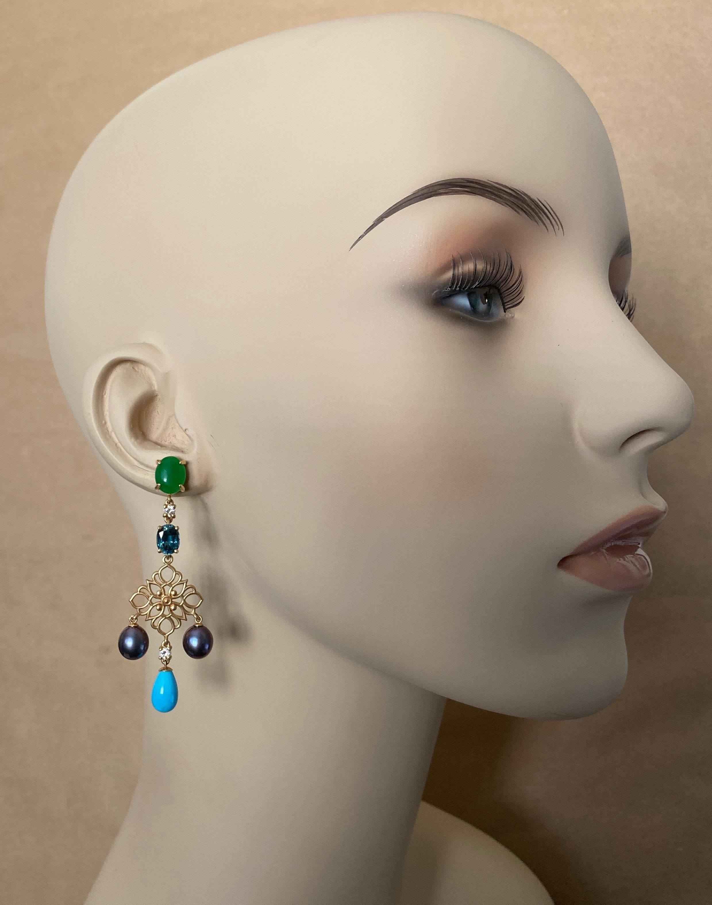 Brilliant apple green chrysoprase (origin: Germany) are combined with turquoise colored, oval cut and faceted zircon (origin: Sri Lanka), white diamonds, black cultured pearls and Sleeping Beauty turquoise drops (origin: Arizona) in these striking