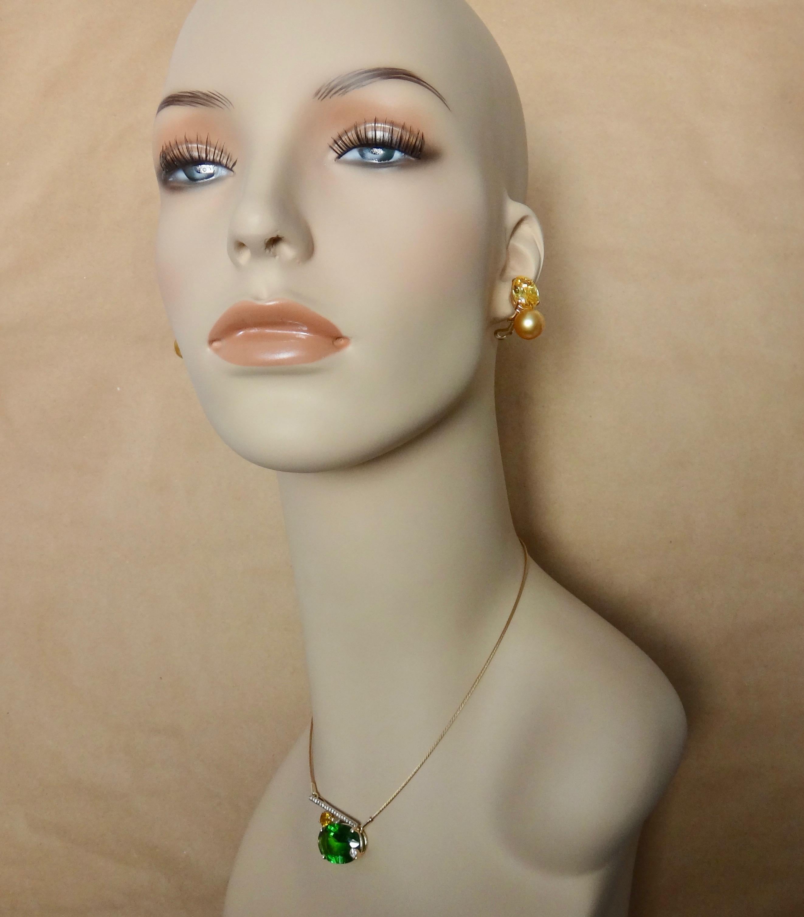Moldavite is a vitreous silica projectile mineral formed during a meteoric impact that occurred in Germany  approximately 15 million years ago.  The gem is not unlike peridot, though a darker and richer forrest green.  This jewel is complimented by