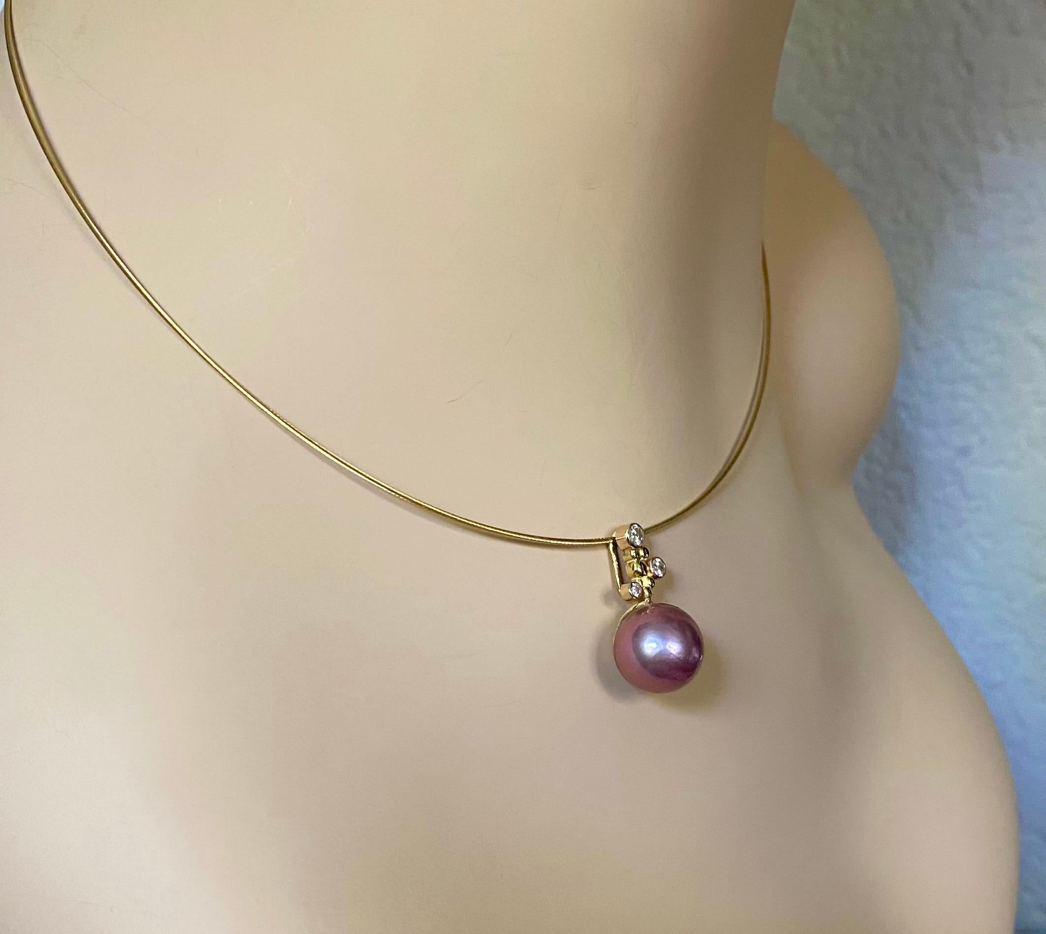 A deep lavender colored Tahitian pearl is featured in this 