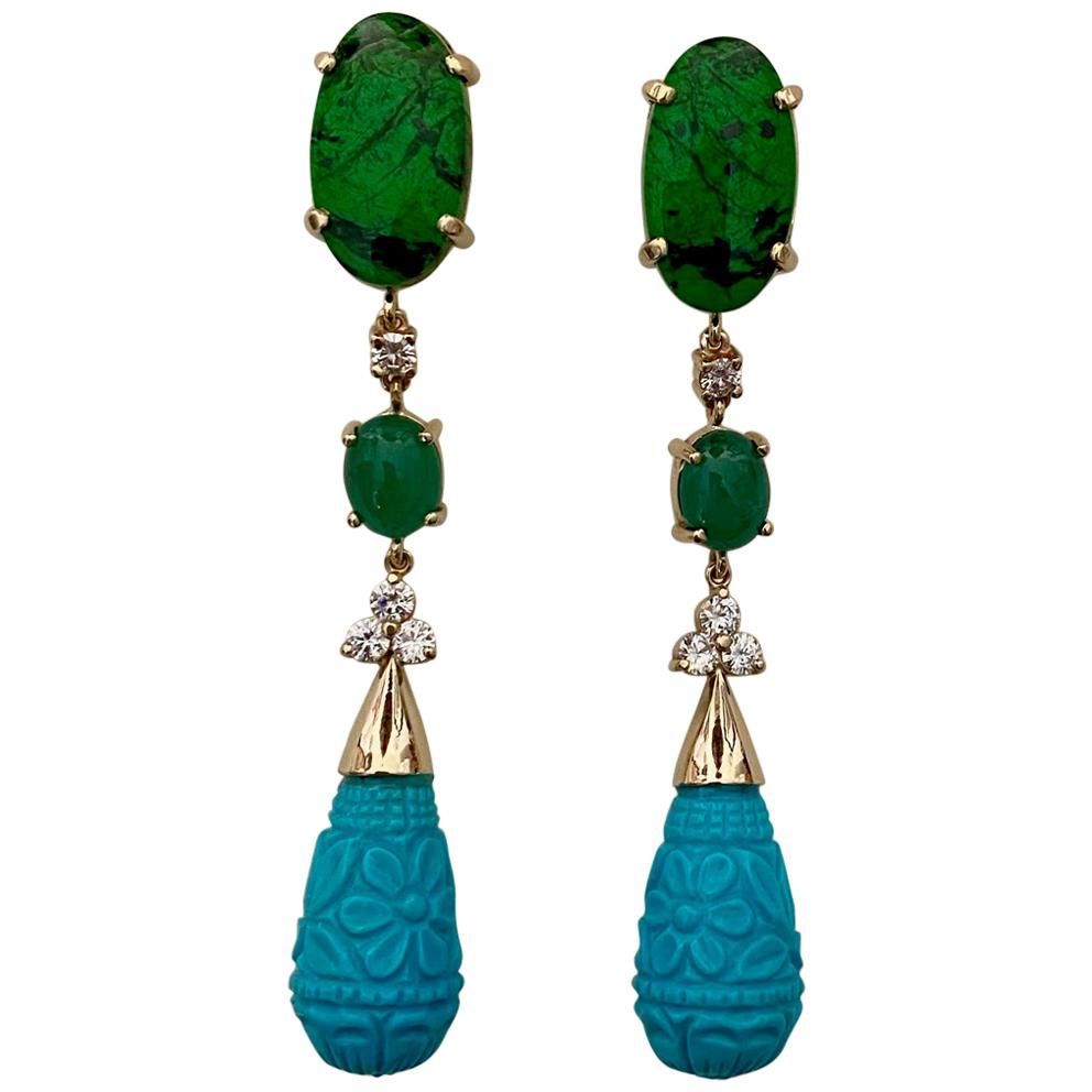  Maw Sit Sit jade is paired with Sleeping Beauty turquoise to form these impressive dangle earrings.  Maw Sit Sit jade is a gemstone discovered in 1963 and found exclusively in northern Myanmar.  It was named after the village close to where the