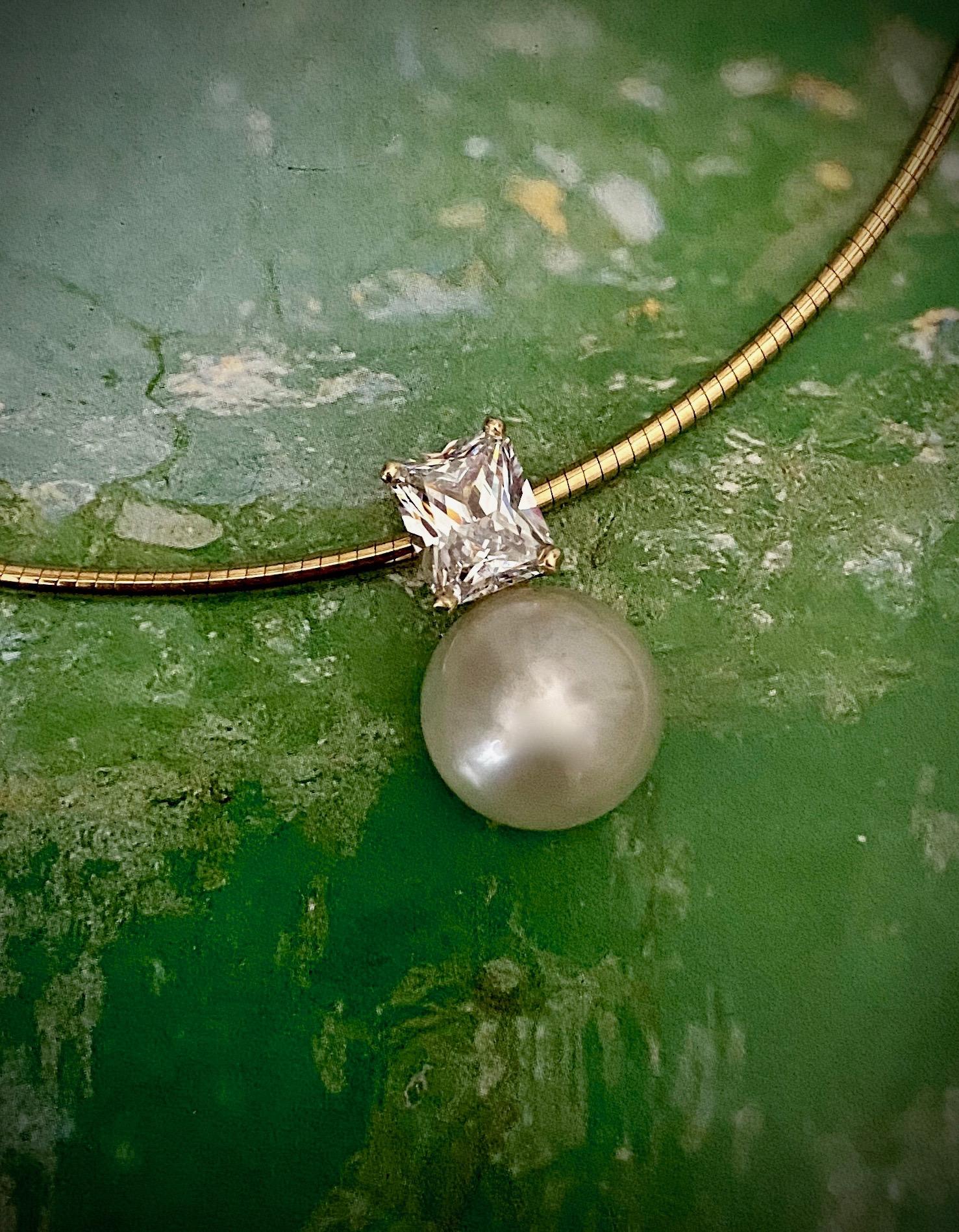 A gem quality Paspaley South Seas pearl is featured in this stunning and uncomplicated pendant.  Paspaley is the largest cultivator of South Seas pearls in Australia.  This specimen possesses an exquisite luster, is blemish free and has a