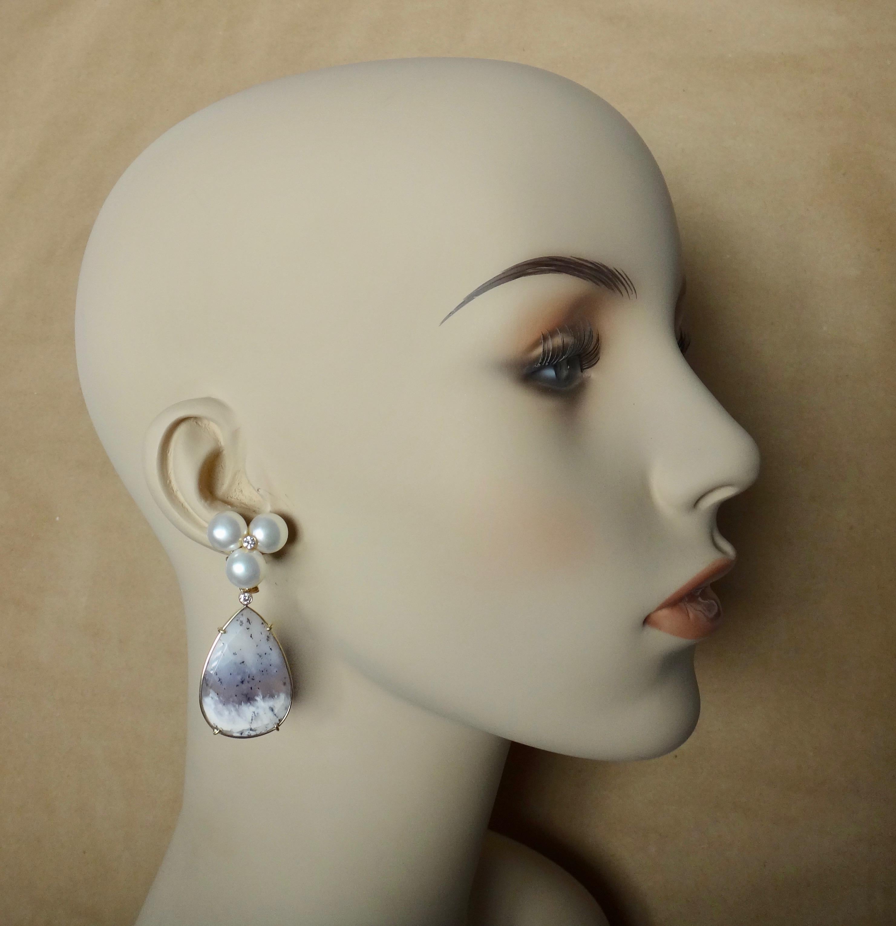 Dendritic opal (origin: New Mexico) are featured in this bold dangle earrings.  The briolette pendants are rose cut pear shapes with dominant colors of ivory and gray/purple.  Highly unusual.  They are removable from the pearl cluster and diamond 