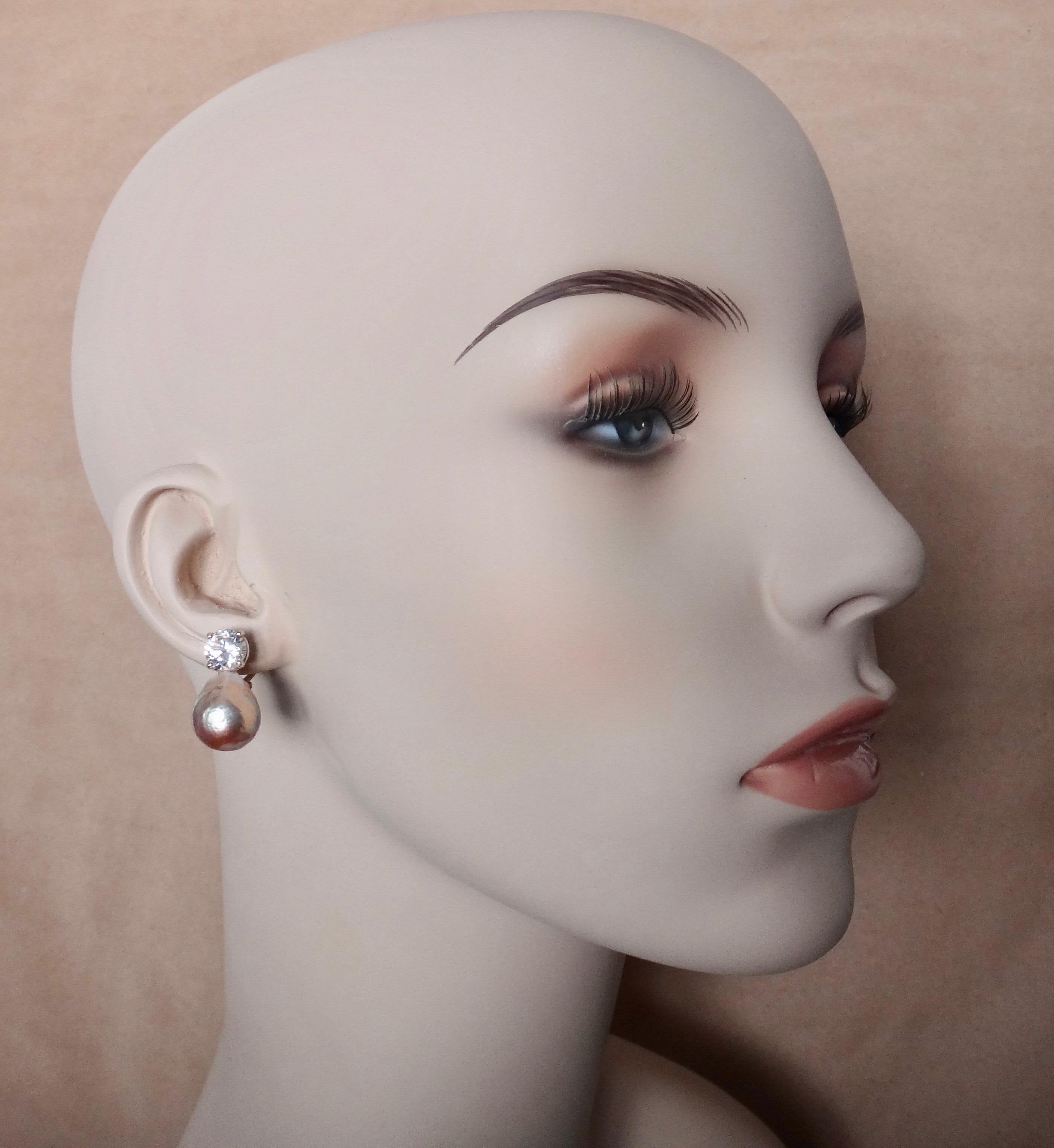 A radiant pair of pink Kasumi pearls (origin: Japan) are paired with brilliant cut white sapphires in these classic drop earrings.  Kasumi pearls are famous for their rich colors and metallic finish.  They measure 15mm long and along with the