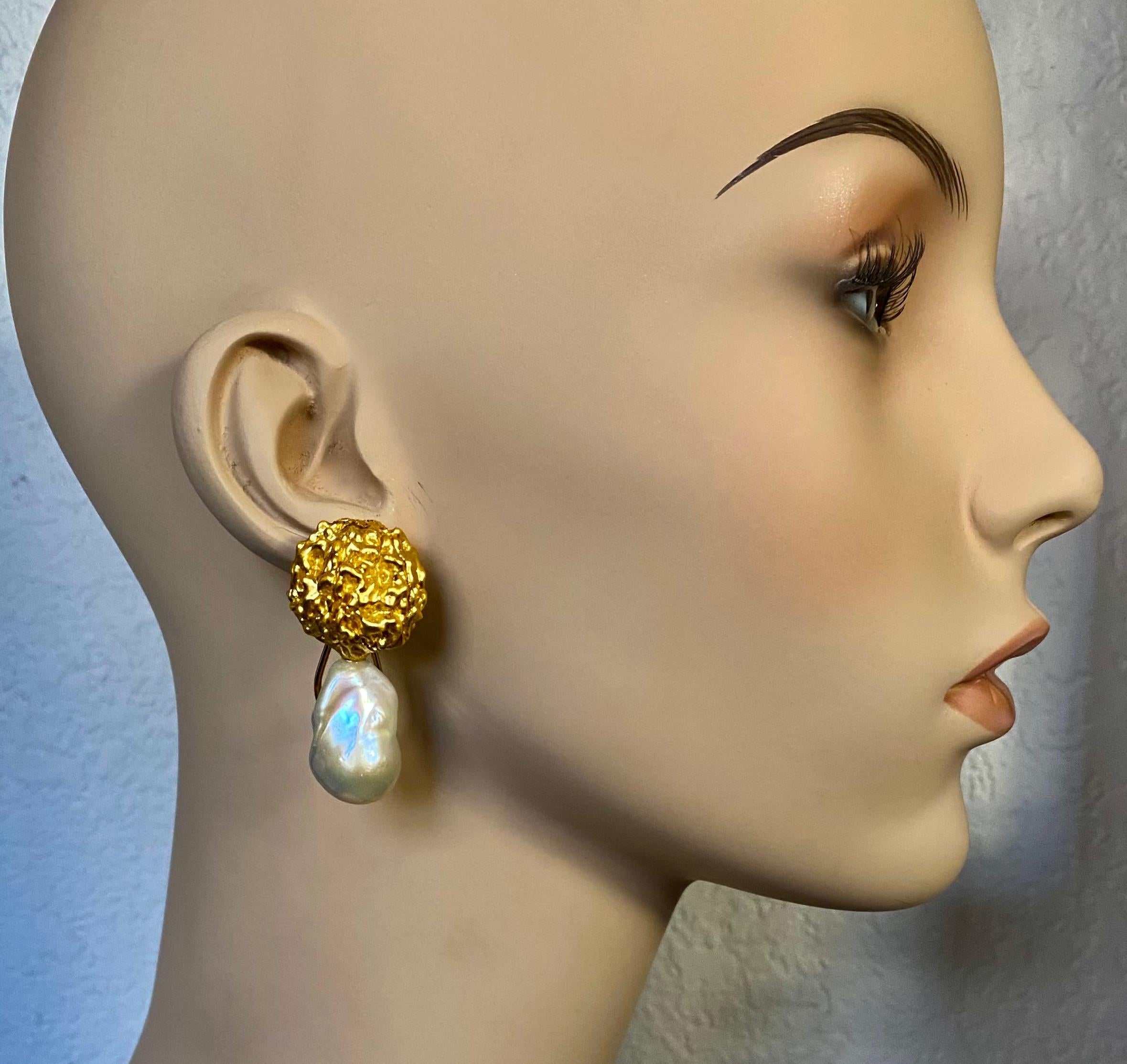 Vintage prayer beads are paired with baroque pearls to create these dramatic drop earrings.  The pearls are well matched in forms typical of baroque pearls.  They are pure white, blemish-free and possess rich luster.   The beads are from old Lotus