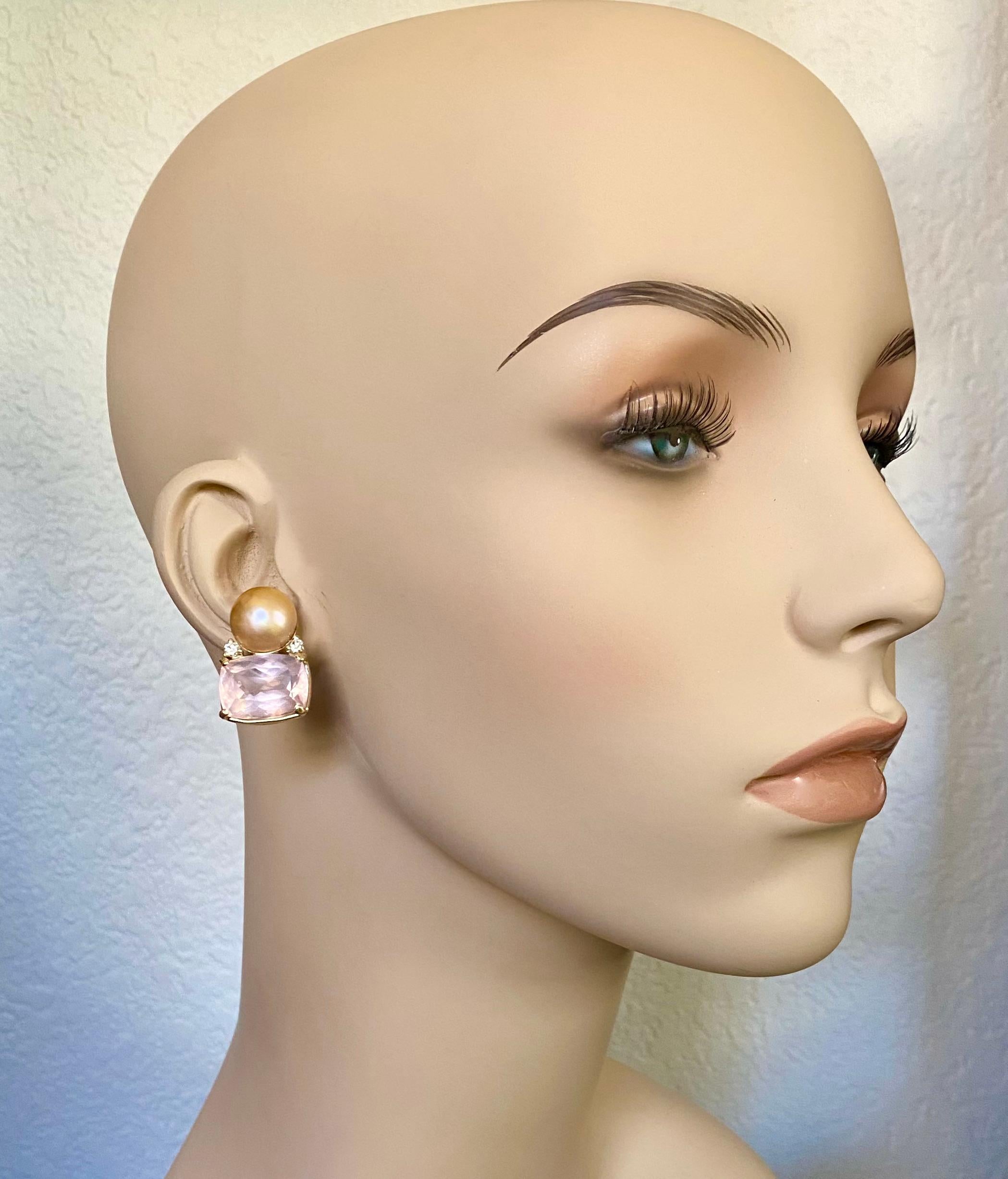 Rose quartz is paired with mobe pearls in these outstanding drop earrings.  The shell pink colored quartz (origin: Brazil) are perfectly matched and are will cut and polished.  Interestingly, they possess flashes of blue deep within the gems.  They