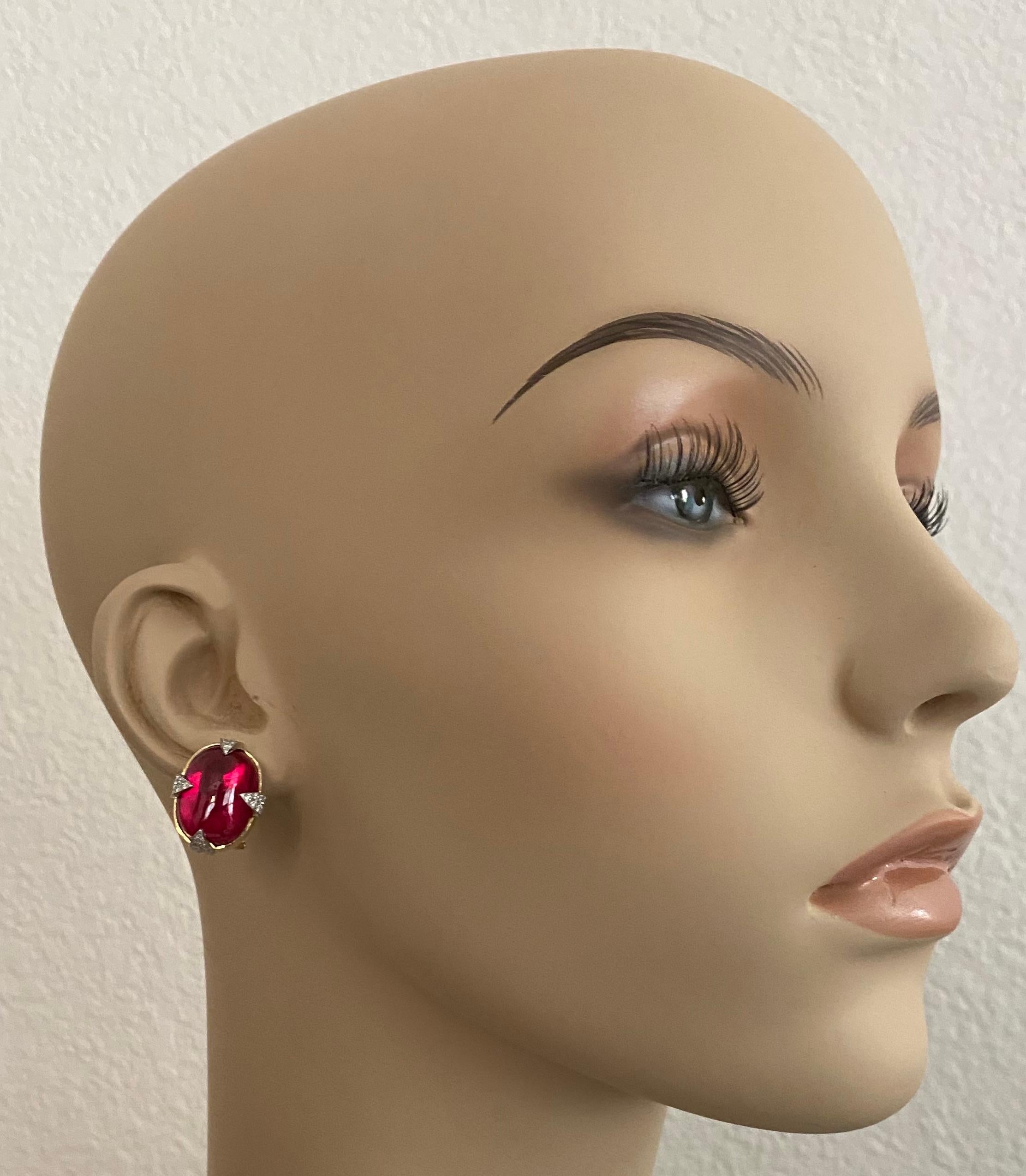 Cabochon rubellite are featured in these sumptuous button earrings.  Rubellite (origin: Brazil) is the red form of tourmaline.  The gems are rich lipstick red, eye clean, very well polished and in playful nugget shapes.  The cabochons are held