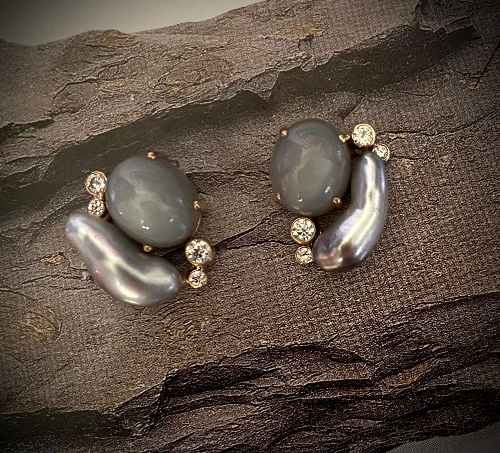 Gray moonstones are paired with Tahitian Keshi pearls in these one-of-a-kind button earrings.  The moonstones (origin: India) are medium gray in color, perfectly matched and well polished.  Keshi pearls form spontaneously during the pearl