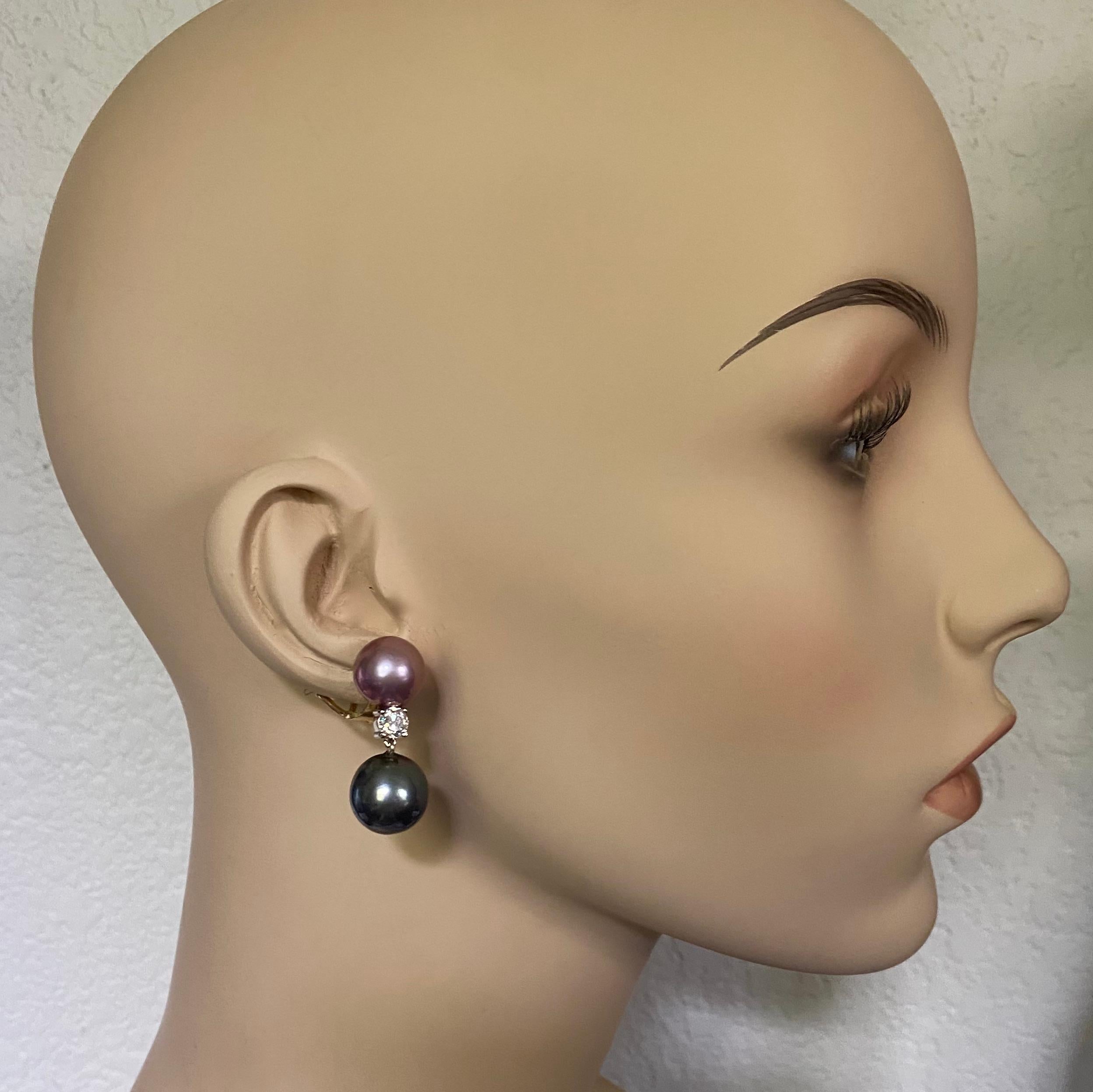 Tahitian and South Seas pearls combine to form these sophisticated dangle earrings.  The pearls measure 12mm and 14mm respectively and are in complementary  shades of pink, rose, dark gray and gold.  The pearls are all gem quality and possess
