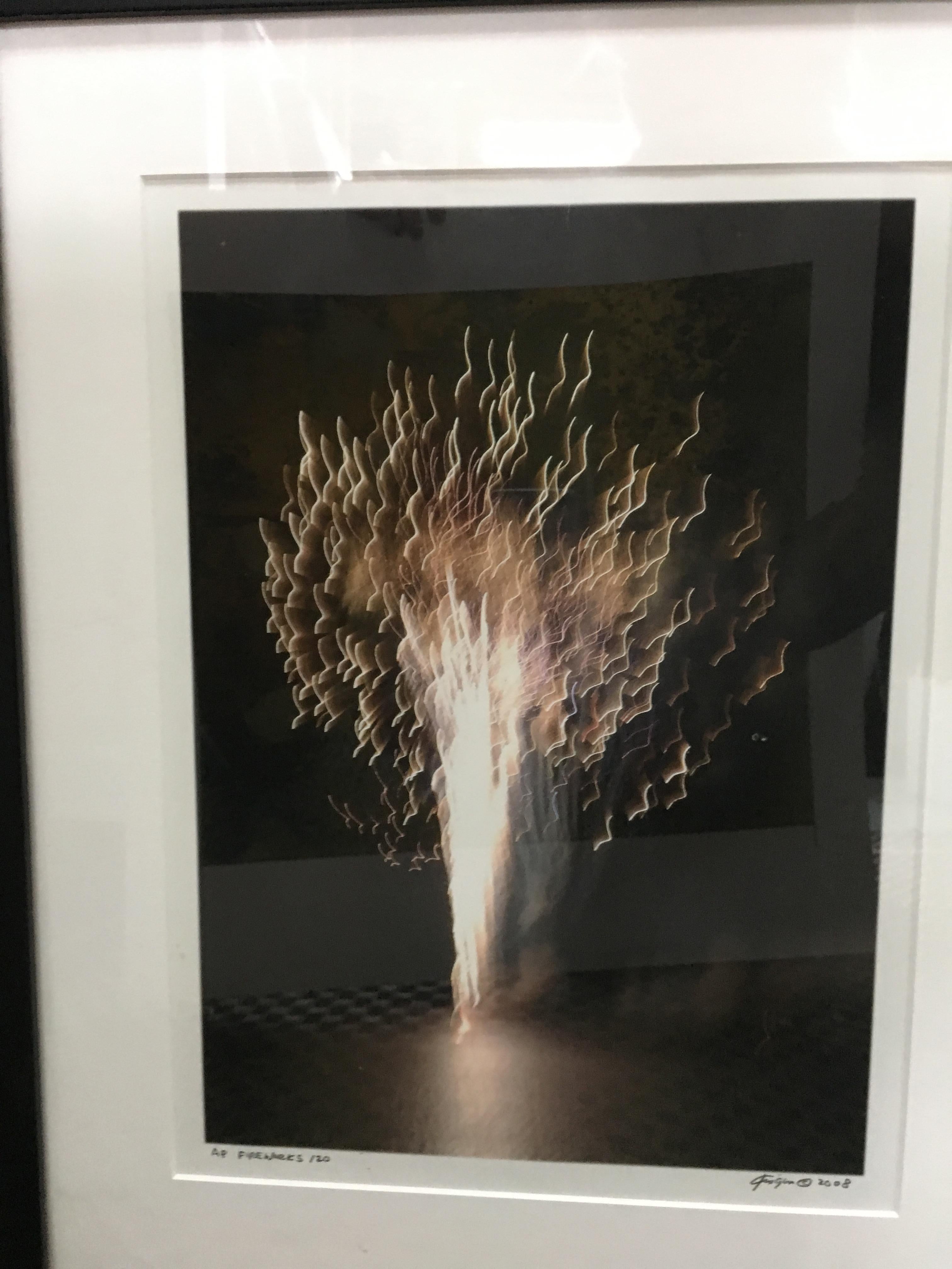 signed and dated slow exposure by michael knign color photo fireworks