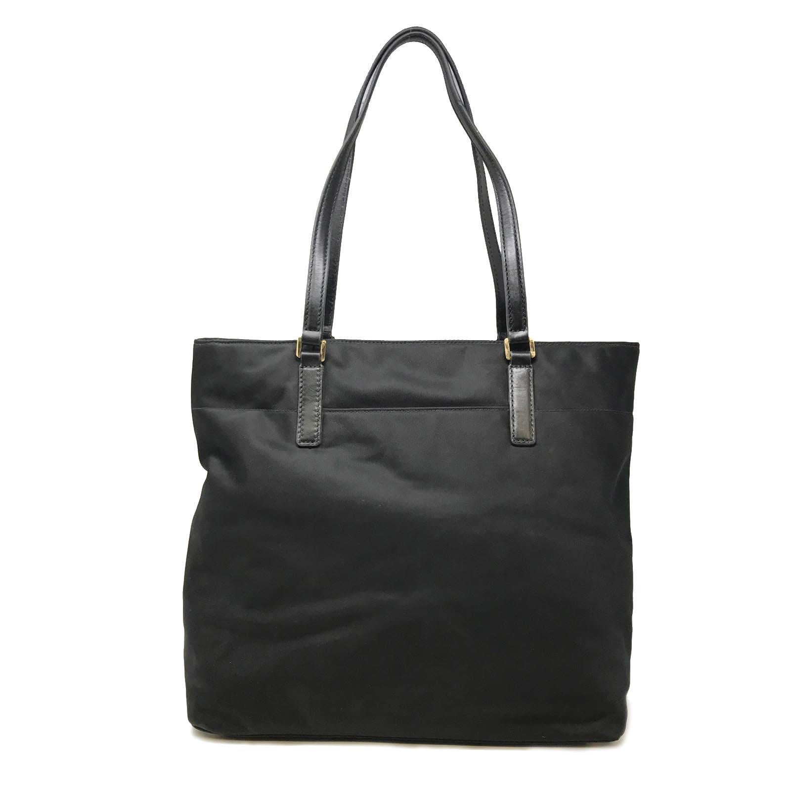 Pre-owned like new women/s bag  have no flaws just some small color marks which is approx not visible.

Sandy beaches and warm-weather locales call for a durable tote. Meet our Morgan, a smart and functional nylon bag able to withstand all the