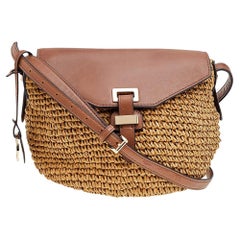 Michael Kors Medium Naomi Umhängetasche aus gewebtem Stroh und Leder in Beige/Braun