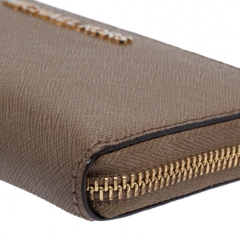 Women's Michael Kors Beige Leather Zip Around Wristlet Wallet For Sale