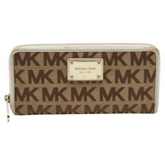 Michael Kors - Portefeuille en toile signature beige/blanc et cuir avec fermeture éclair