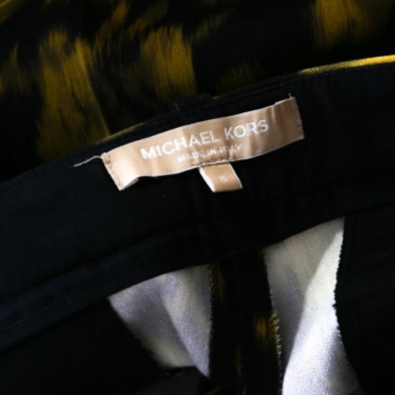 Donna Michael Kors Pantaloni affusolati in lana con stampa Ikkat nera e gialla M. I. in vendita