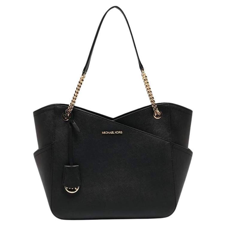 Michael Kors Bolso grande de piel negro con cadena Jet Set