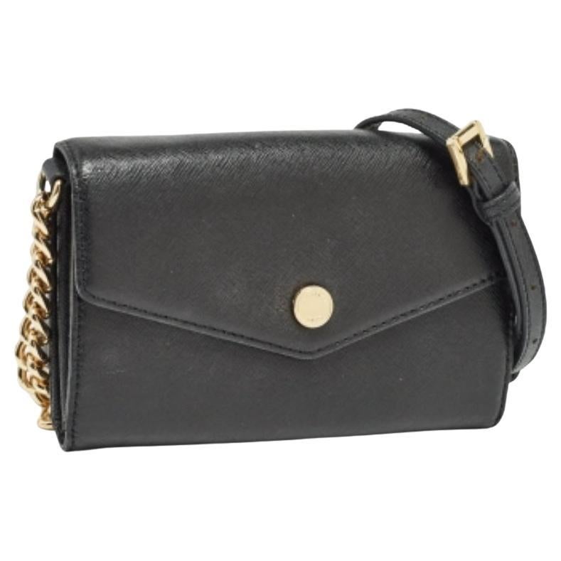 Michael Kors Mini bolso cruzado tipo sobre de piel negra