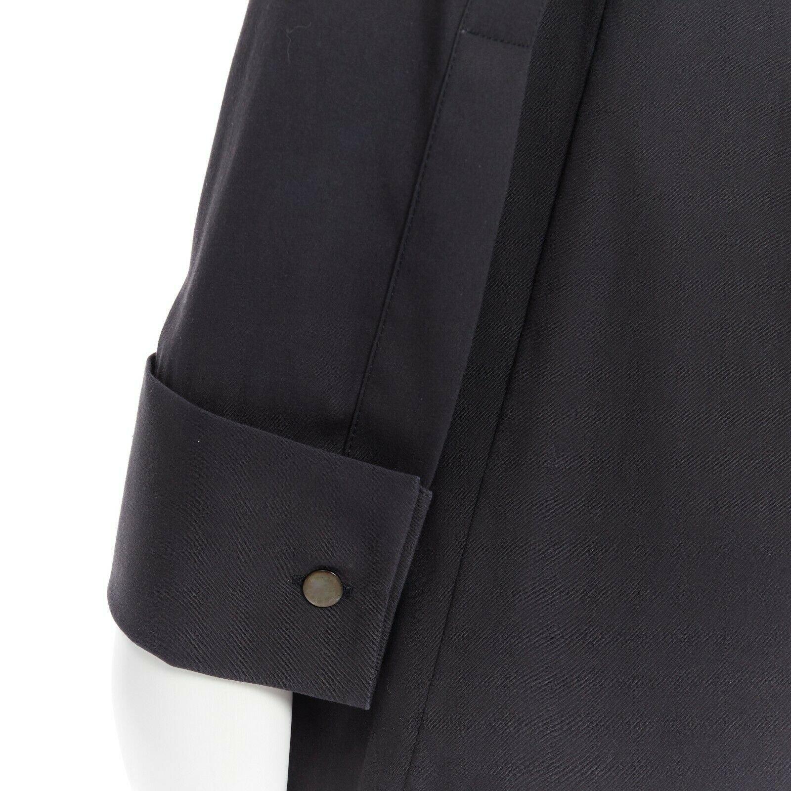 MICHAEL KORS black peak spread collar folded cuffs patch pocket long shirt US0
Reference: LNKO/A01148
Brand: Michael Kors
Material: Cotton
Color: Black
Pattern: Solid
Closure: Button
Extra Detail: Elongated shirt. Spread collar. Folded cuffs. Patch