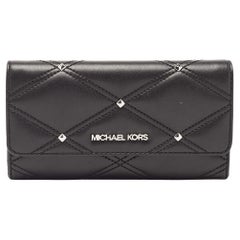 Used Michael Kors Black Quilted Leather Jet Set Travel Trifold Continental Wallet