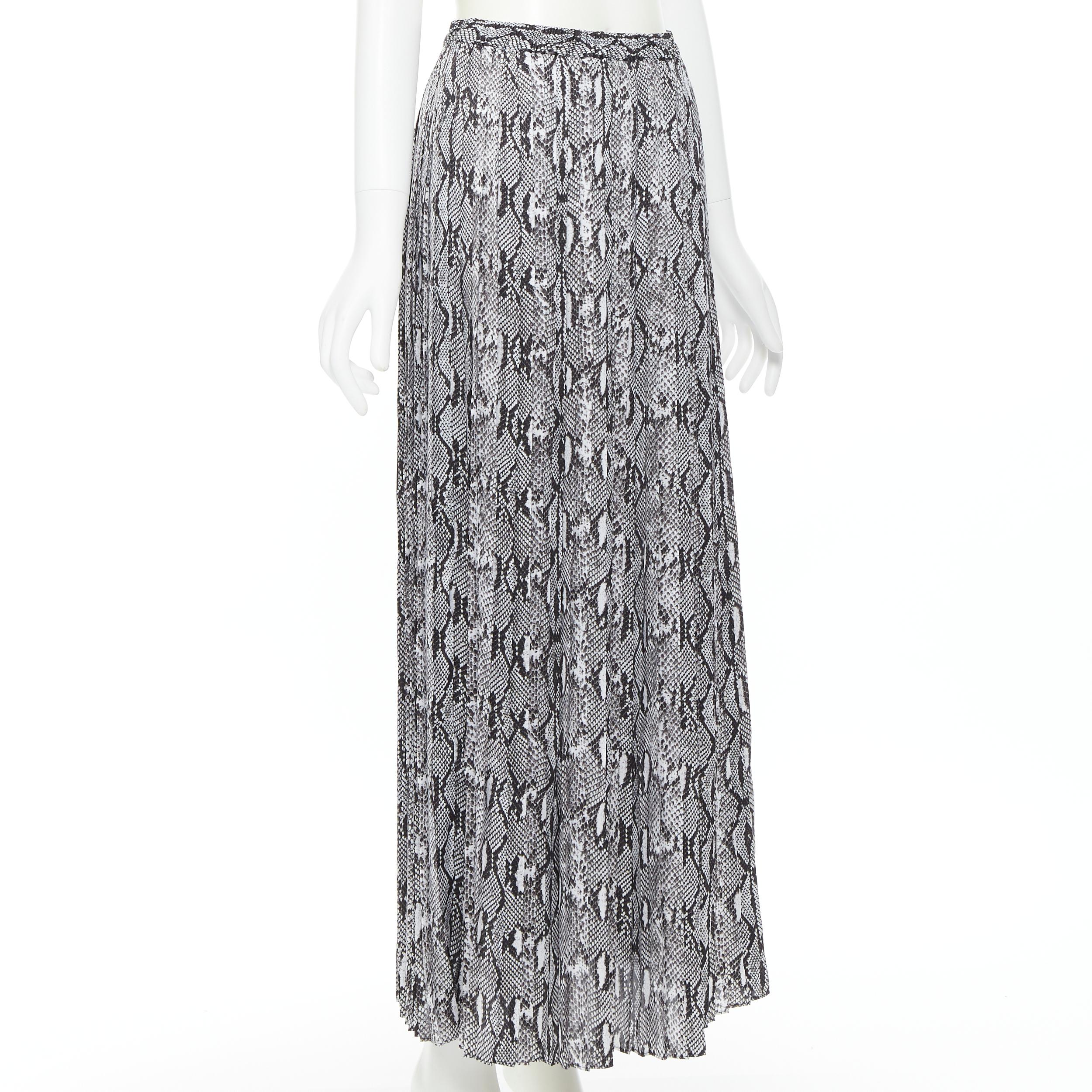 MICHAEL KORS black white python print pleated midi summer skirt XS 
Reference: TGAS/B00455 
Brand: Michael Kors 
Designer: Michael Kors 
Material: Polyester 
Color: Grey 
Pattern: Snakeskin 
Extra Detail: Elasticated waist. Pleated skirt. Python