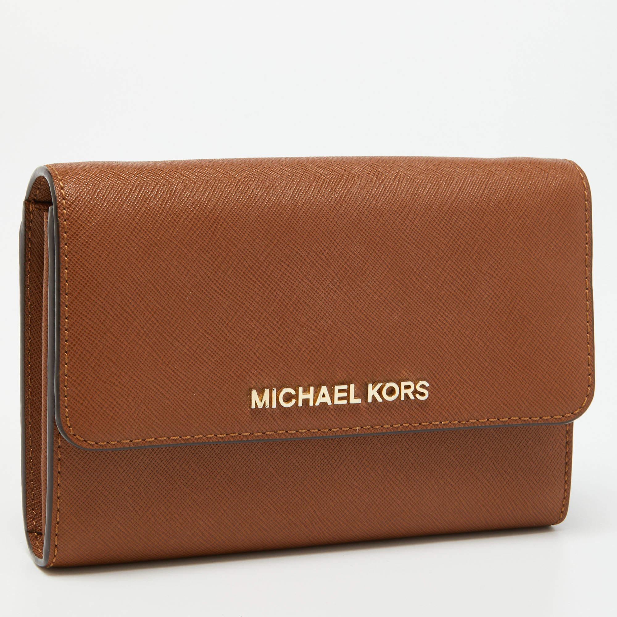 Michael Kors Brown Leather Flap Wallet In Fair Condition For Sale In Dubai, Al Qouz 2