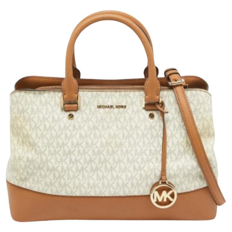 Cartera Savannah de Michael Kors en lona revestida y piel marrón/blanca con la firma de la marca