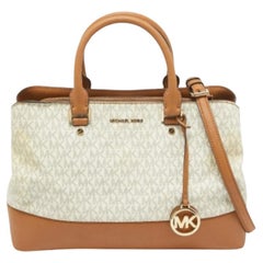 Cartera Savannah de Michael Kors en lona revestida y piel marrón/blanca con la firma de la marca