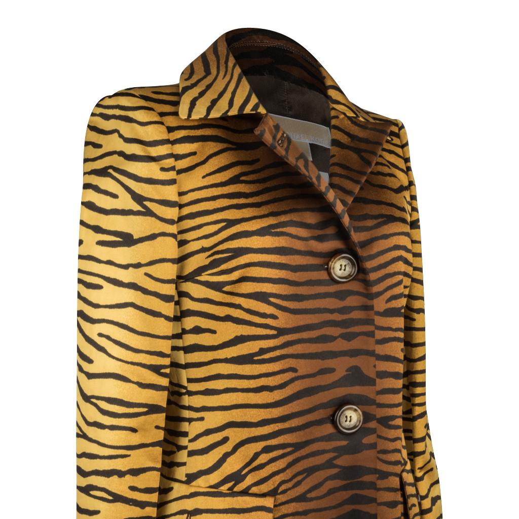 Fabulous Michael Kors timeless animal print satin coat.
Divine sleek narrow cut in a luscious tiger print. 
Unique mix of golden yellow to warm aromatic tobacco and chocolate.
2 Large flap pockets, each with a working button.
5 Button single